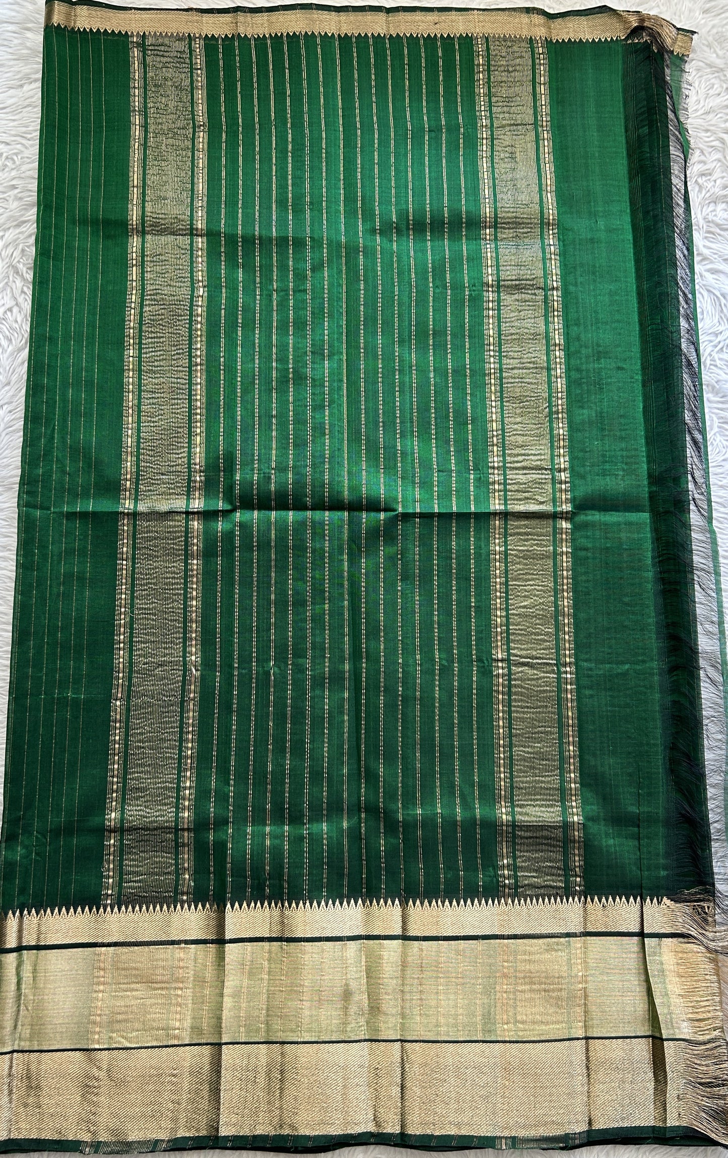 Mangalagiri Plain Pattu Saree Green colored complemented with a mangalagiri Border - Sampradaya Designer Studio