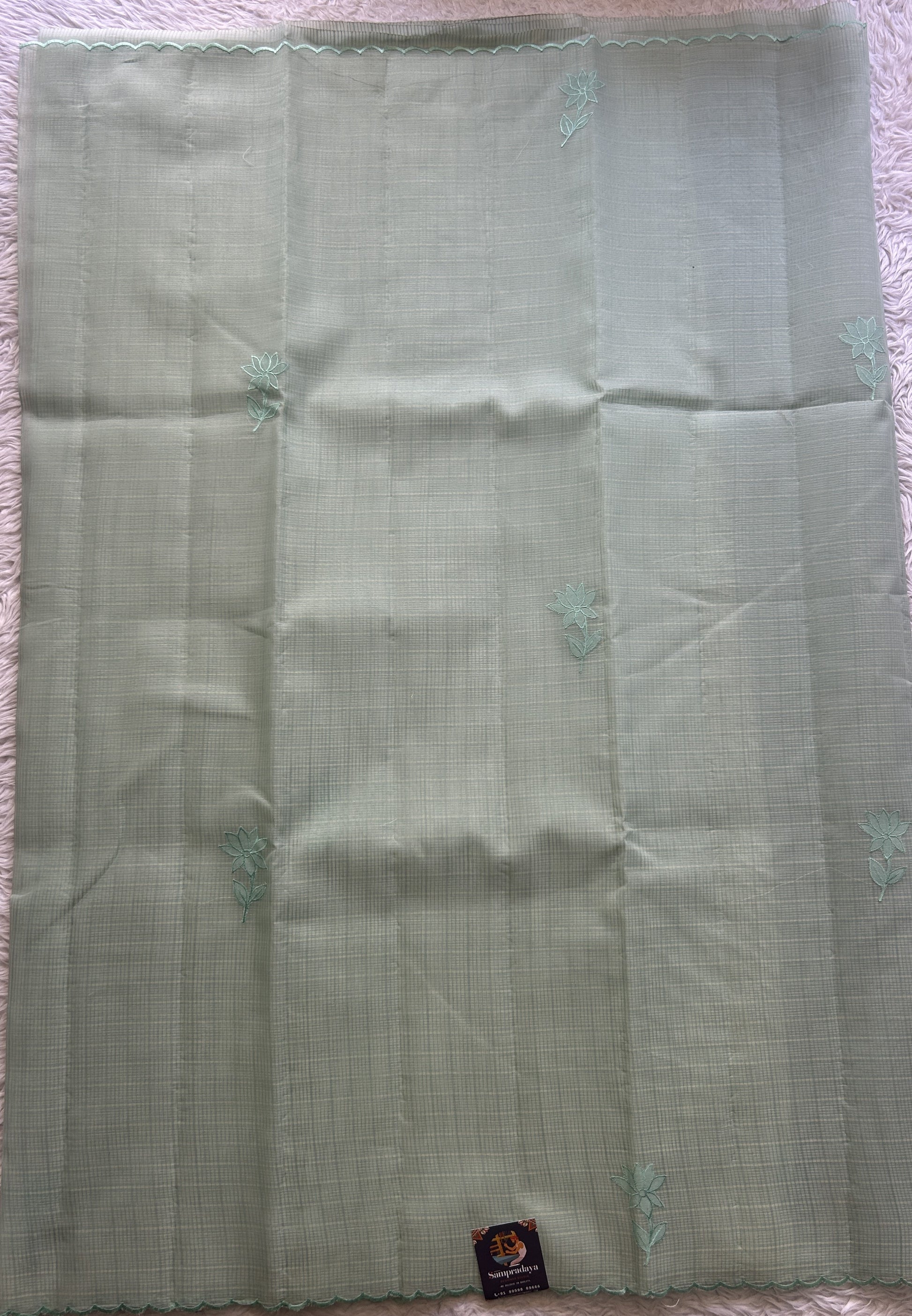 Silk kota Saree Mint Mist colored Complemented with a Scallop Border. - Sampradaya Designer Studio