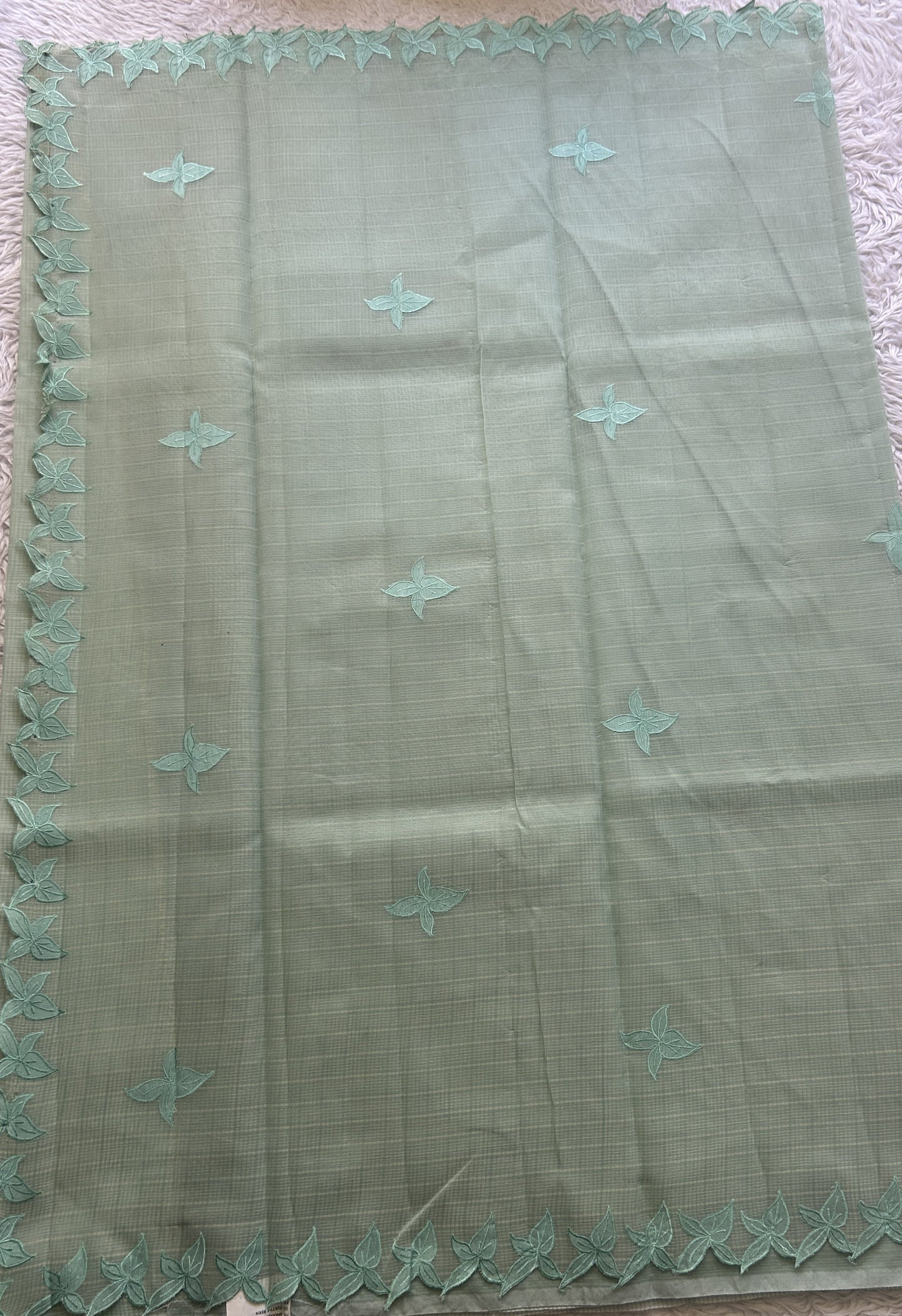 Silk kota Saree Mint colored Complemented with a Applique Border. - Sampradaya Designer Studio