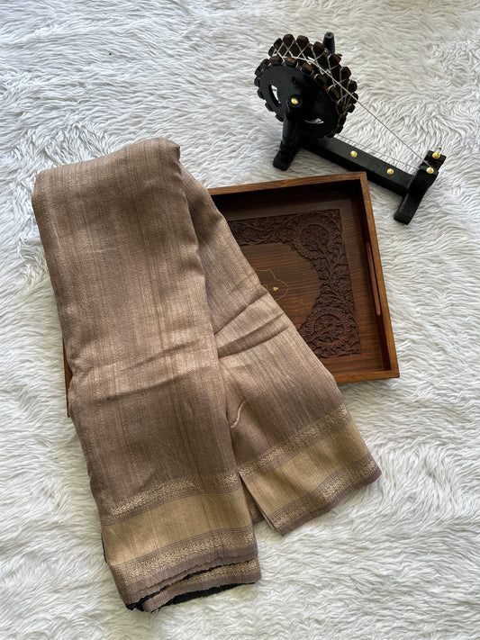 Pure Matka and Muslin Saree Beige Colored Complemented with a Thread Border. - Sampradaya Designer Studio