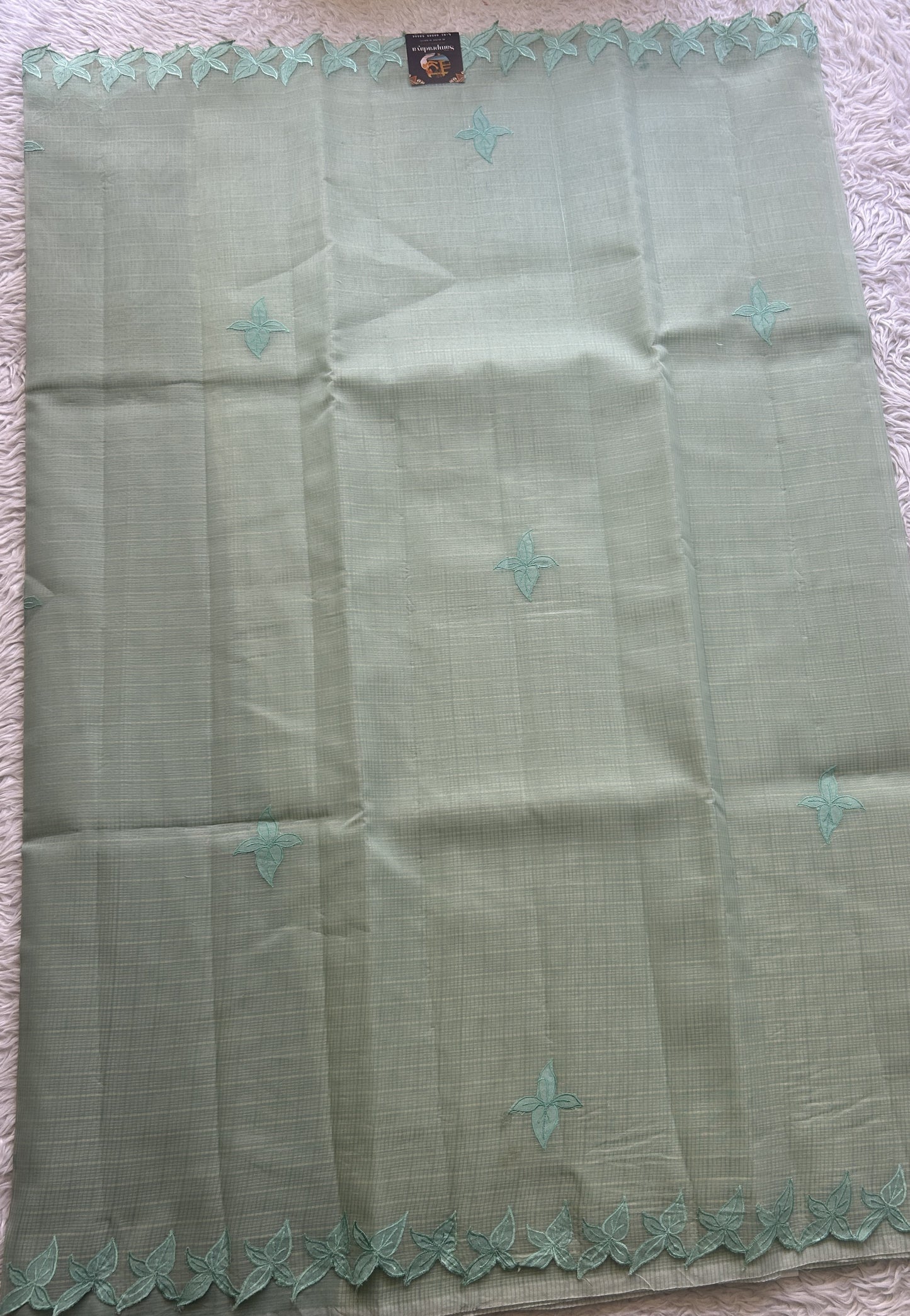 Silk kota Saree Mint colored Complemented with a Applique Border. - Sampradaya Designer Studio