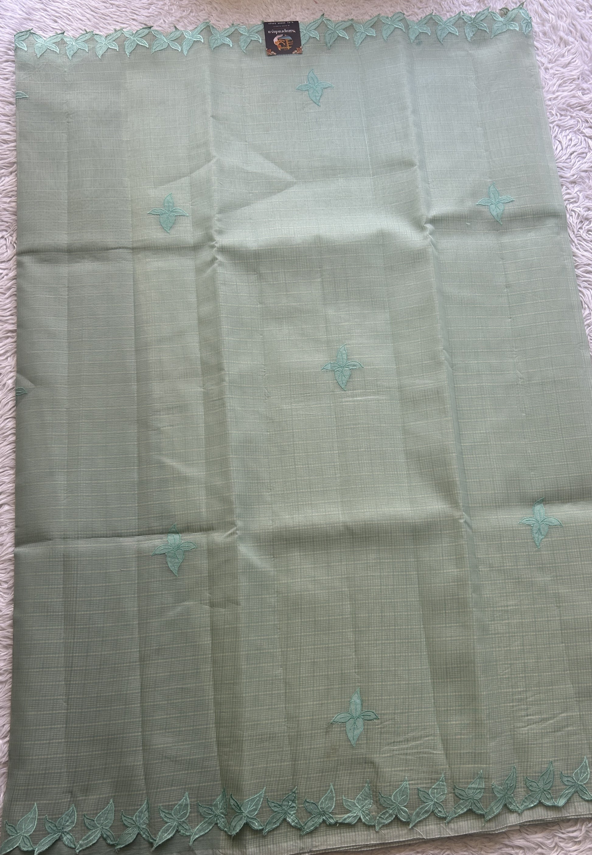 Silk kota Saree Mint colored Complemented with a Applique Border. - Sampradaya Designer Studio