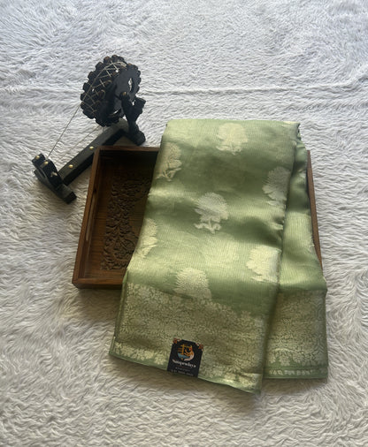 Banarasi Tissue Kora Saree Light Green Colored Complemented with a Zari Border. - Sampradaya Designer Studio
