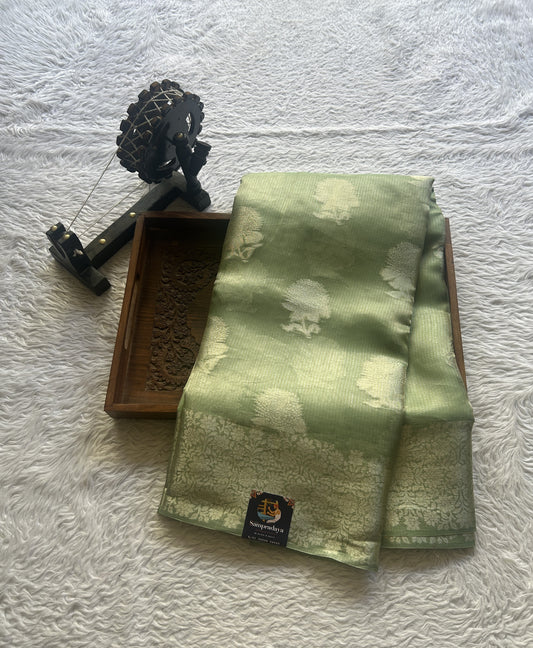 Banarasi Tissue Kora Saree Light Green Colored Complemented with a Zari Border. - Sampradaya Designer Studio