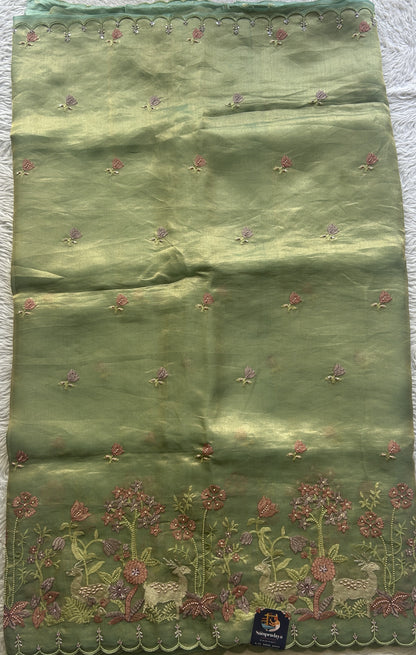 Banarasi Tissue Kora Saree Green Colored Complemented with a Scallop Border. - Sampradaya Designer Studio