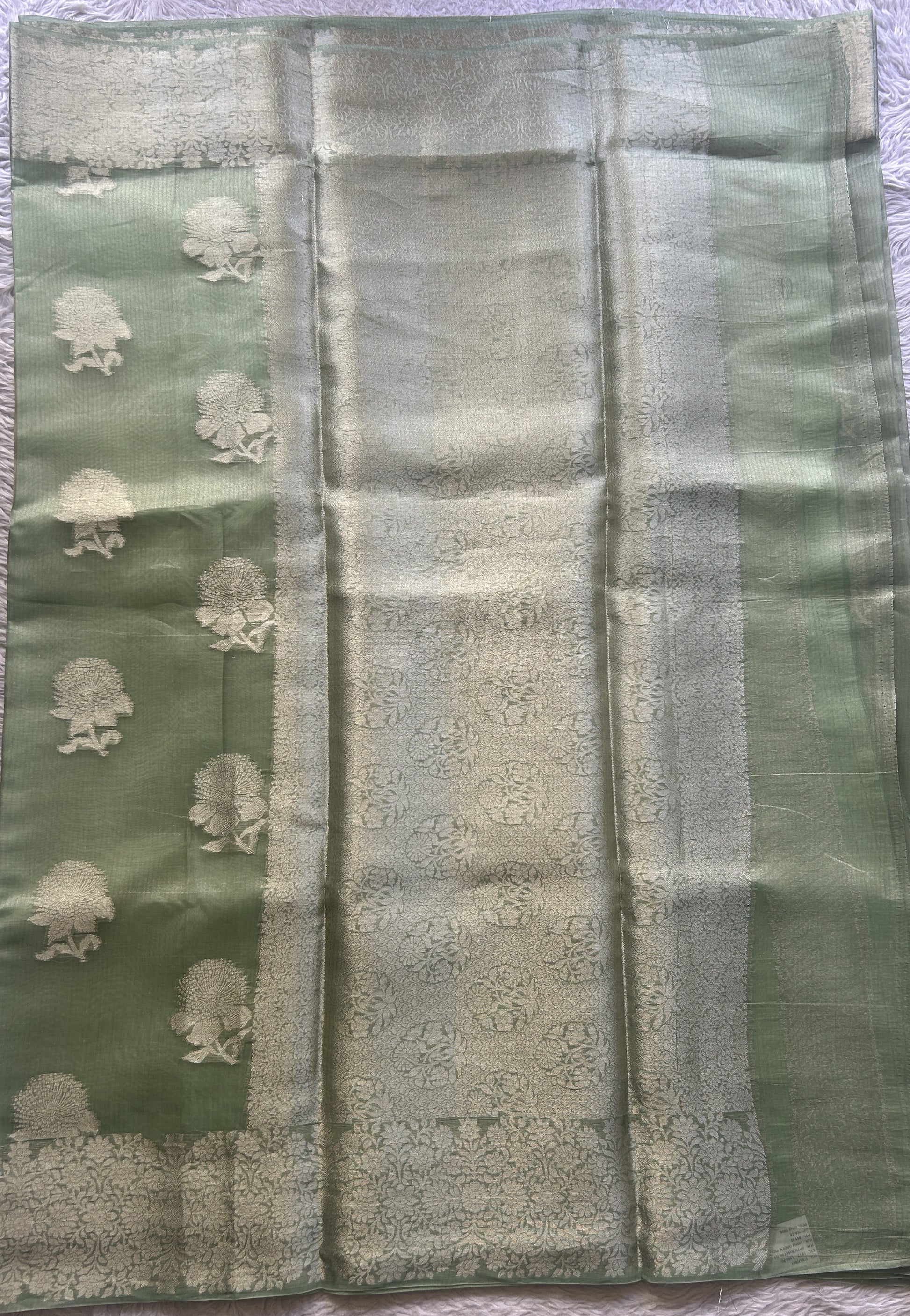 Banarasi Tissue Kora Saree Light Green Colored Complemented with a Zari Border. - Sampradaya Designer Studio