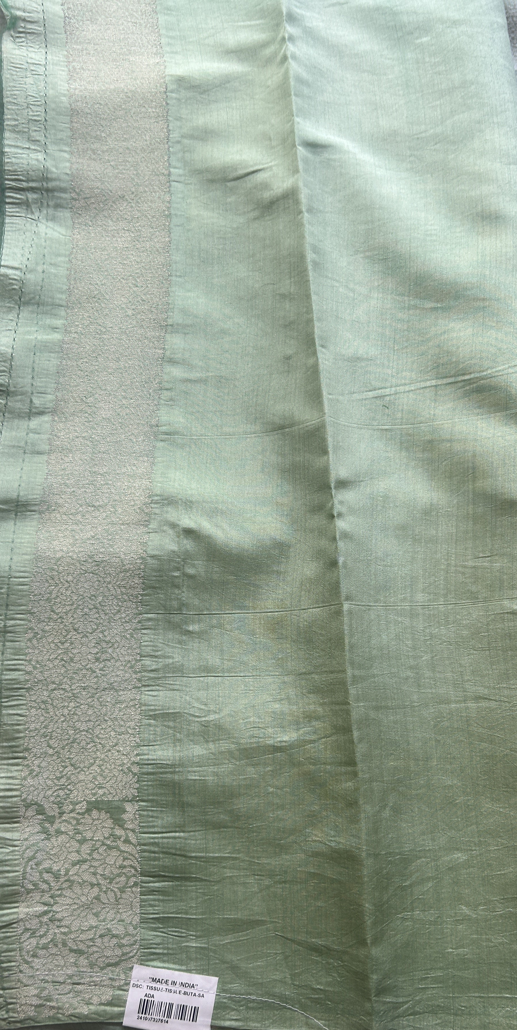 Banarasi Tissue Kora Saree Light Green Colored Complemented with a Zari Border. - Sampradaya Designer Studio