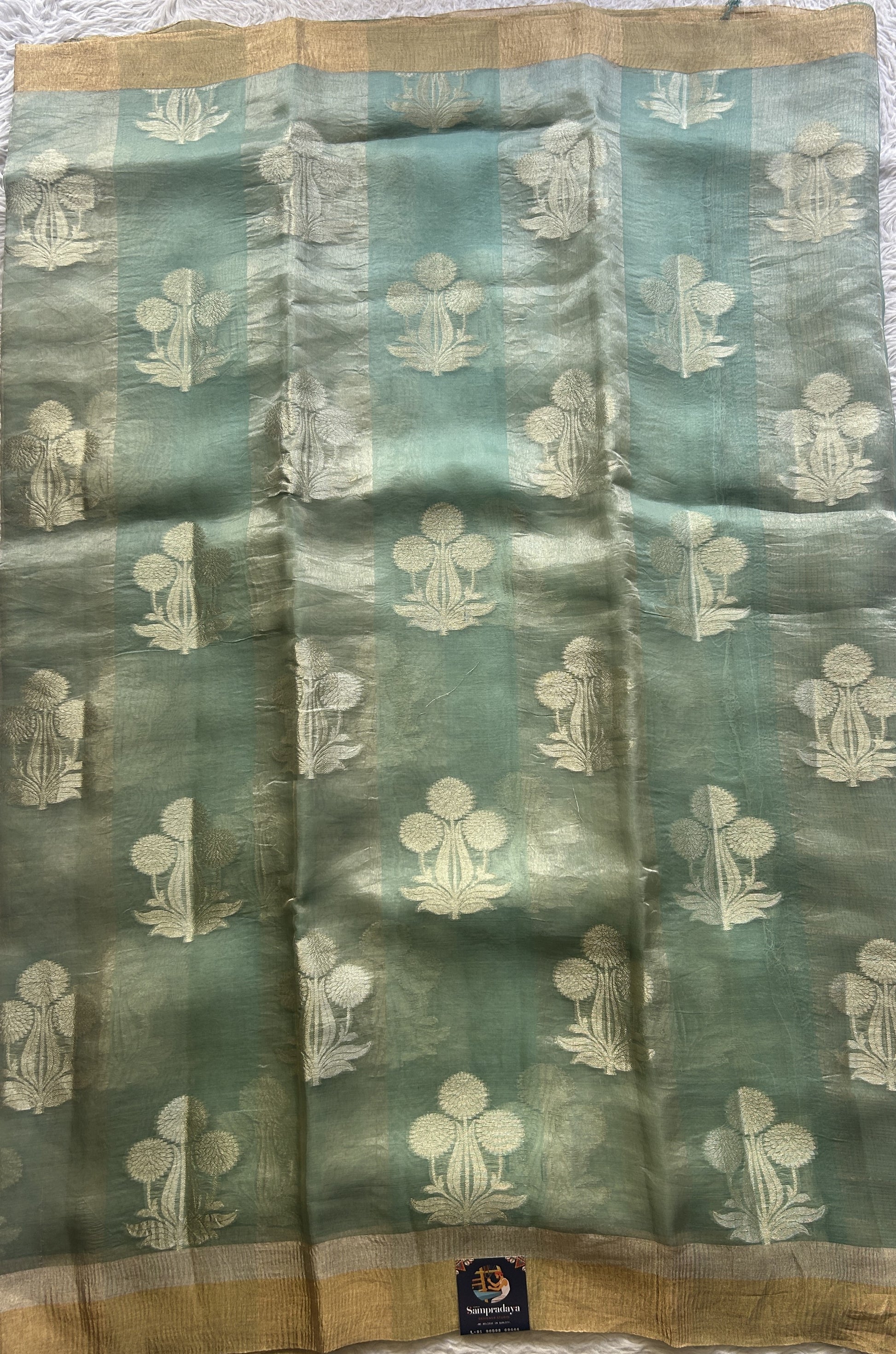 Banarasi Tissue Kora Saree Light Blue Colored Complemented with a Zari Border. - Sampradaya Designer Studio