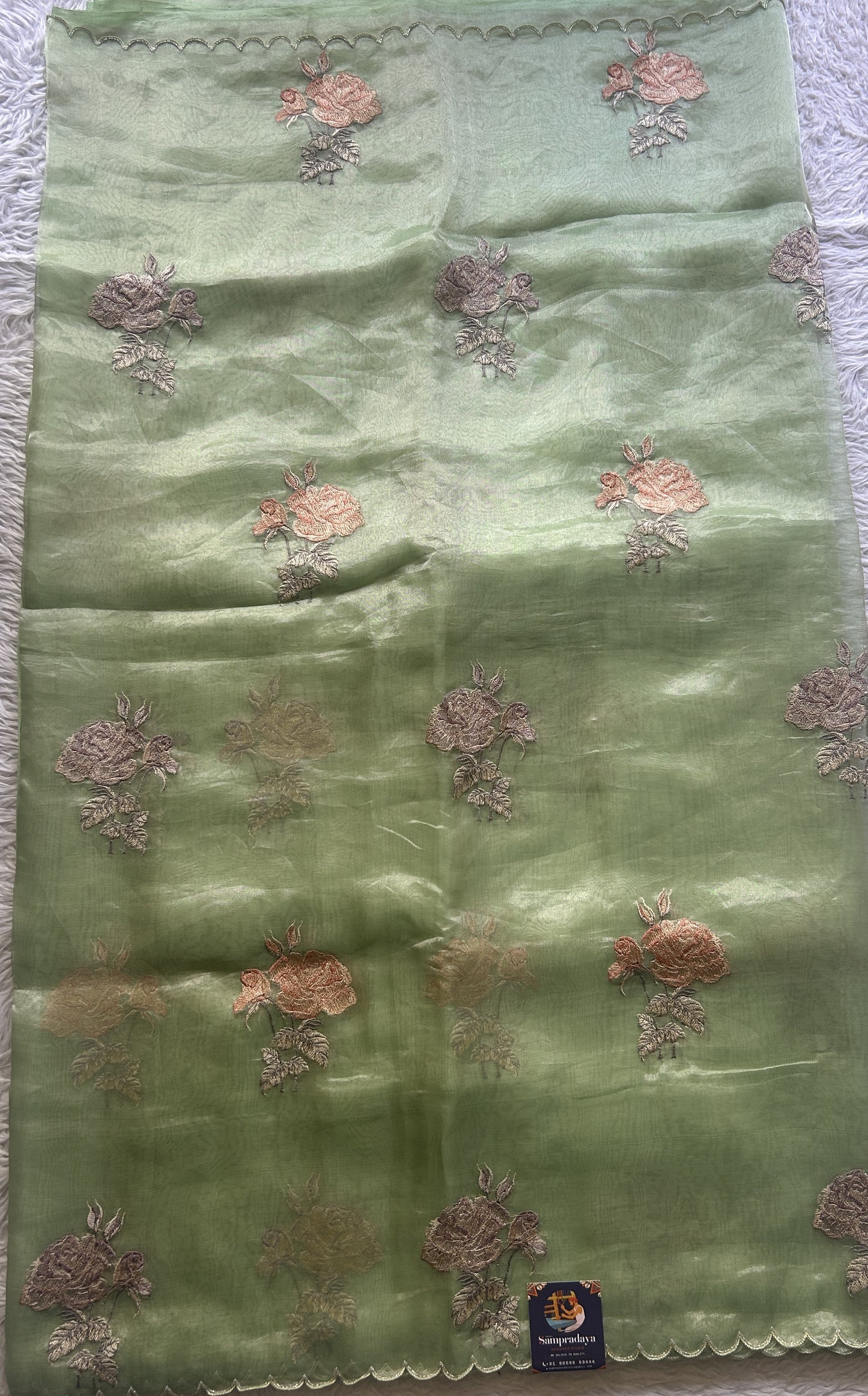 Banarasi Tissue Kora Saree Parrot Green Colored Complemented with a Scallop Border. - Sampradaya Designer Studio