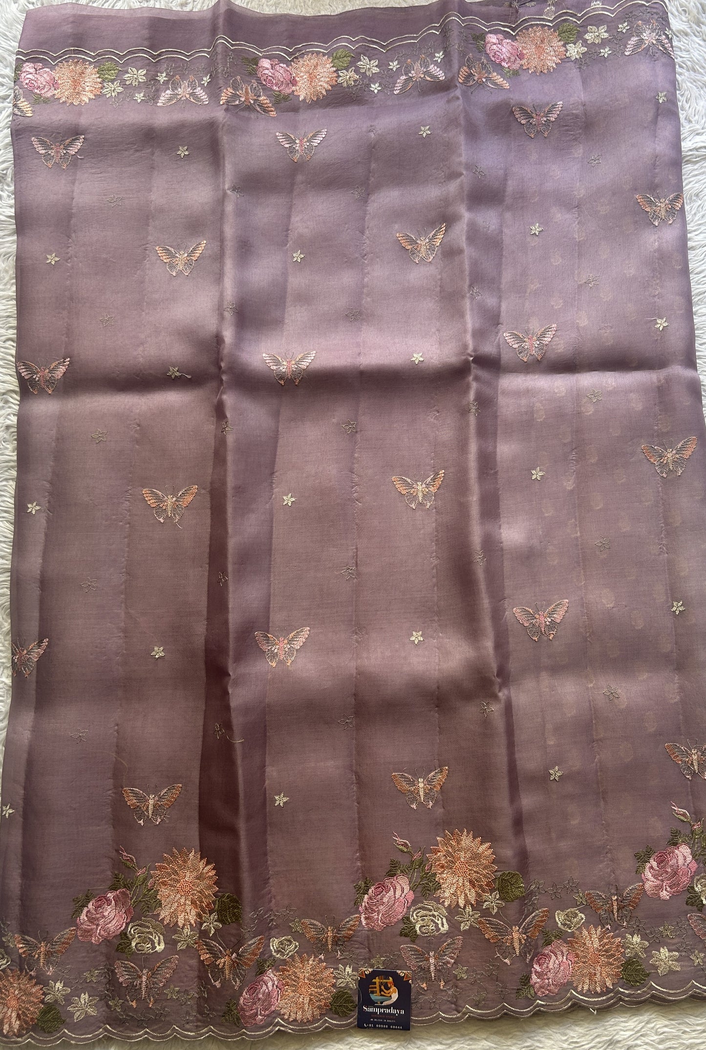 Banarasi Tissue Kora Saree Lilac Colored Complemented with a Scallop Border. - Sampradaya Designer Studio