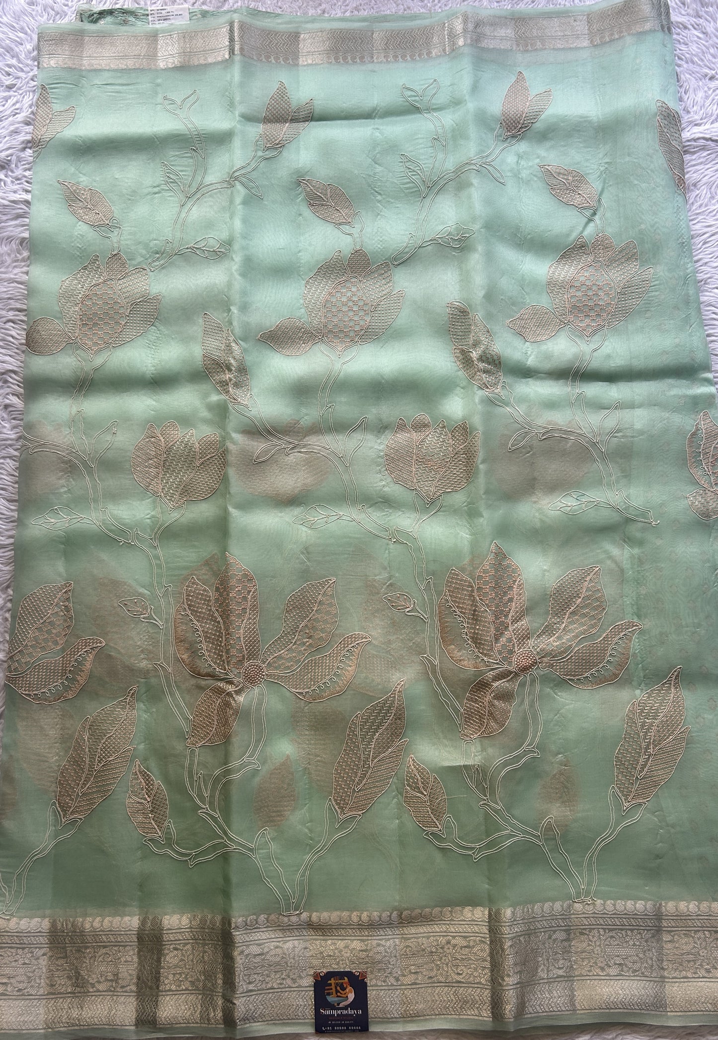 Banarasi Tissue Kora Saree Sea Green Colored Complemented with a Scallop Border. - Sampradaya Designer Studio