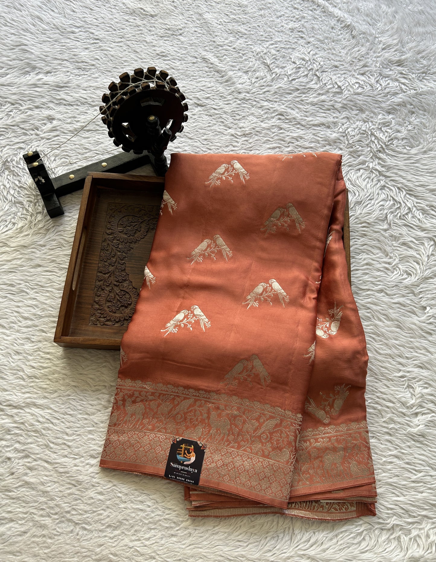 Banarasi Georgette Saree Peach Colored Complemented with a Zari border. - Sampradaya Designer Studio