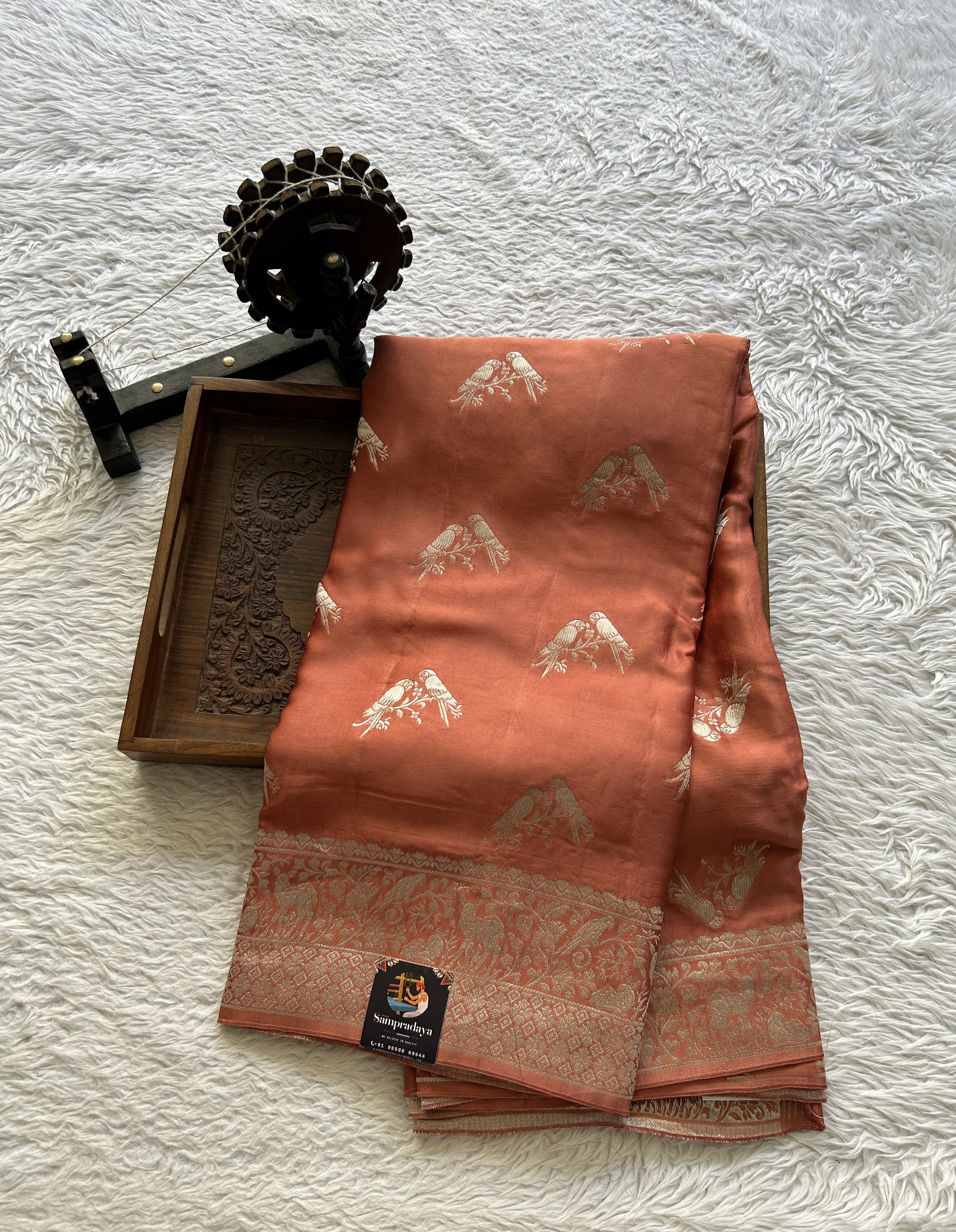 Banarasi Georgette Saree Peach Colored Complemented with a Zari border. - Sampradaya Designer Studio