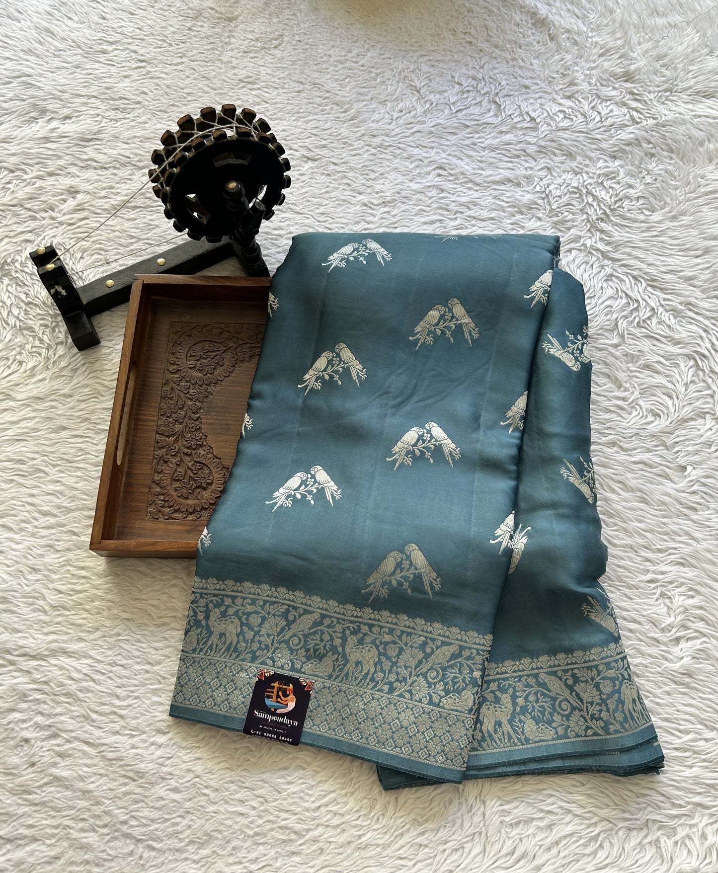 Banarasi Georgette Saree Teal Blue Colored Complemented with a Zari border. - Sampradaya Designer Studio