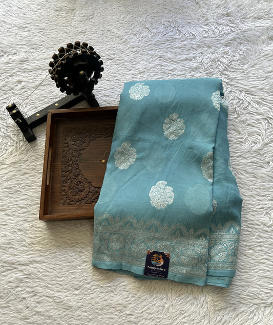 Banarasi Georgette Saree Light Sea Blue Colored Complemented with a Zari border. - Sampradaya Designer Studio