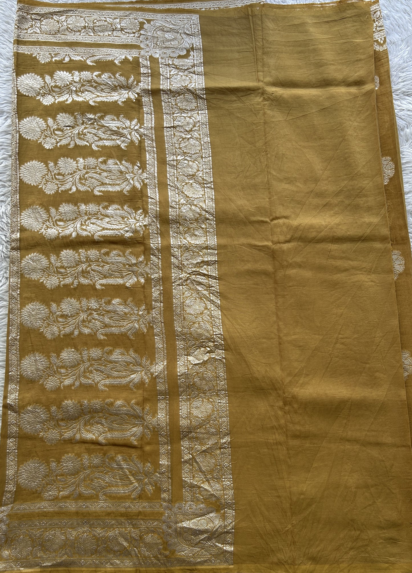 Banarasi Georgette Saree Mustard Colored Complemented with a Zari border. - Sampradaya Designer Studio