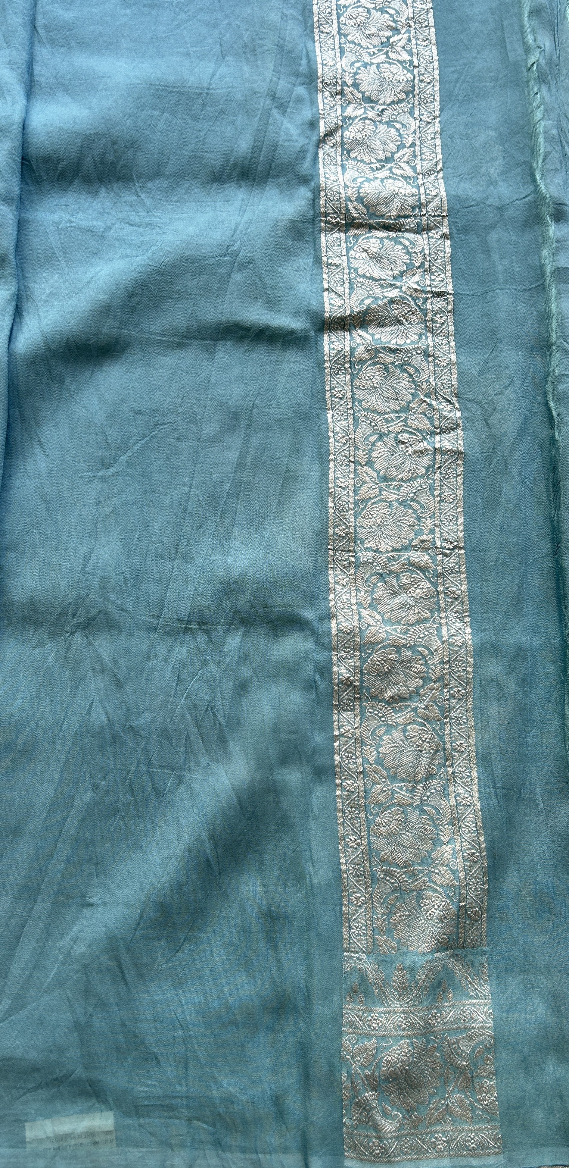 Banarasi Georgette Saree Light Sea Blue Colored Complemented with a Zari border. - Sampradaya Designer Studio