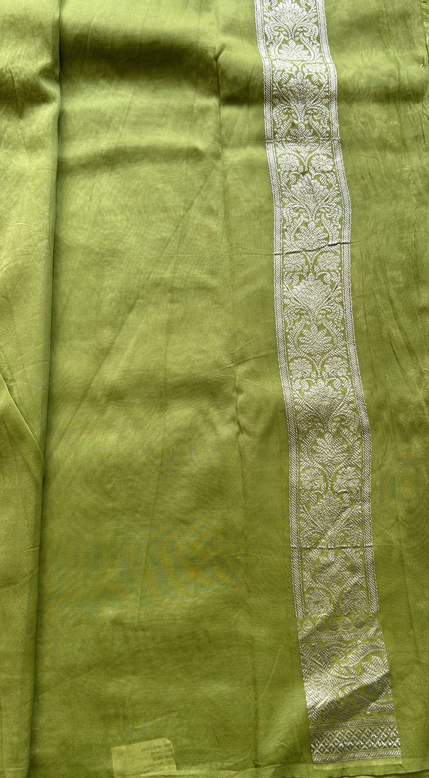Banarasi Georgette Saree Parrot Green Colored Complemented with a Zari border. - Sampradaya Designer Studio