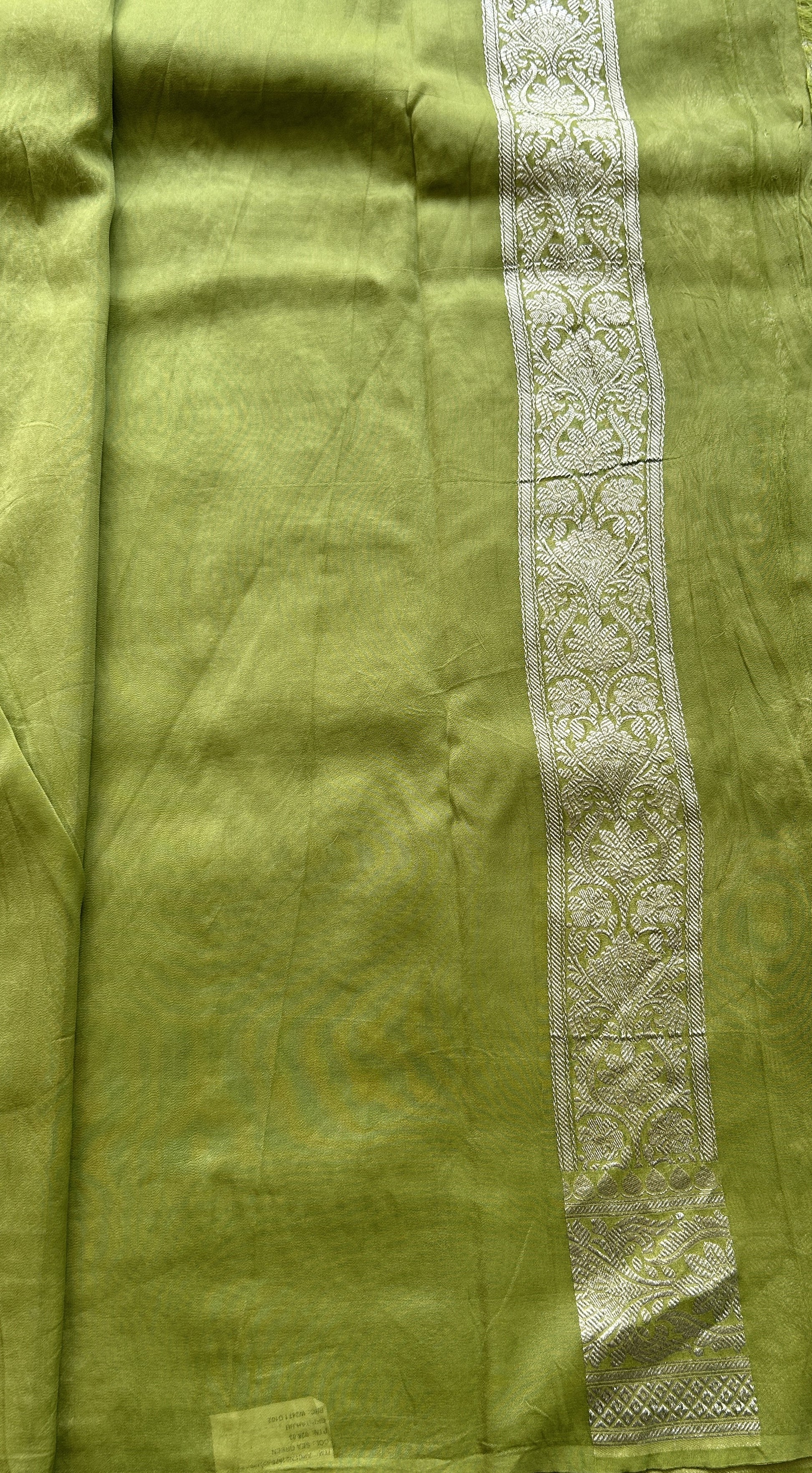 Banarasi Georgette Saree Parrot Green Colored Complemented with a Zari border. - Sampradaya Designer Studio
