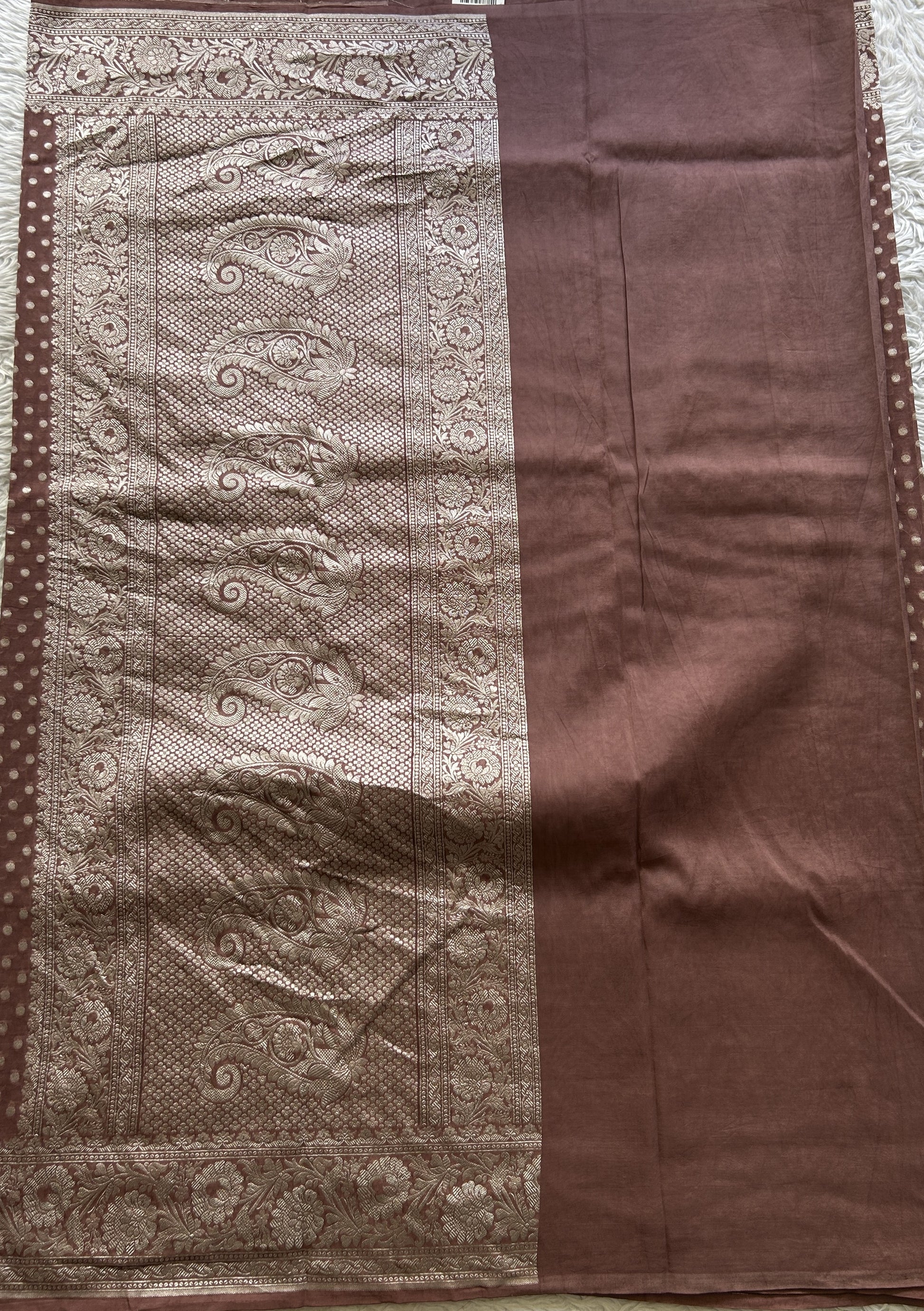 Banarasi Georgette Saree Brown Colored Complemented with a Zari border. - Sampradaya Designer Studio