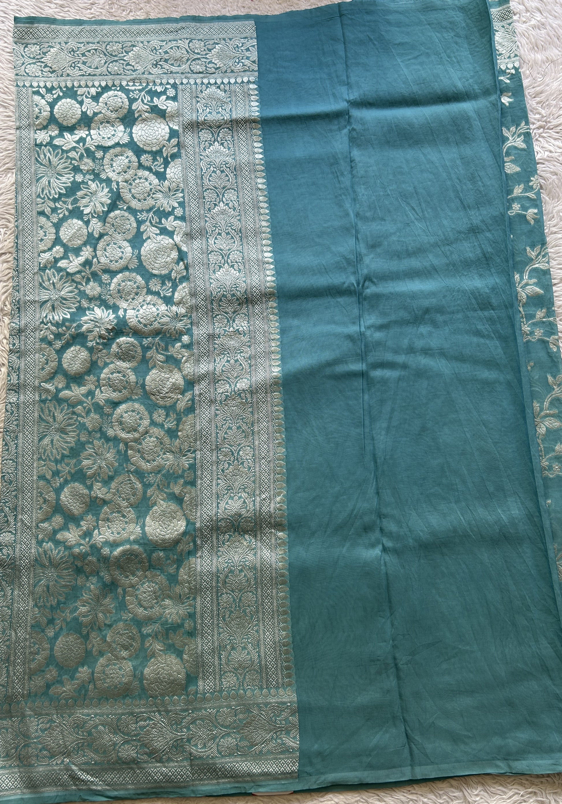 Banarasi Georgette Saree Light Blue Colored Complemented with a Zari border. - Sampradaya Designer Studio