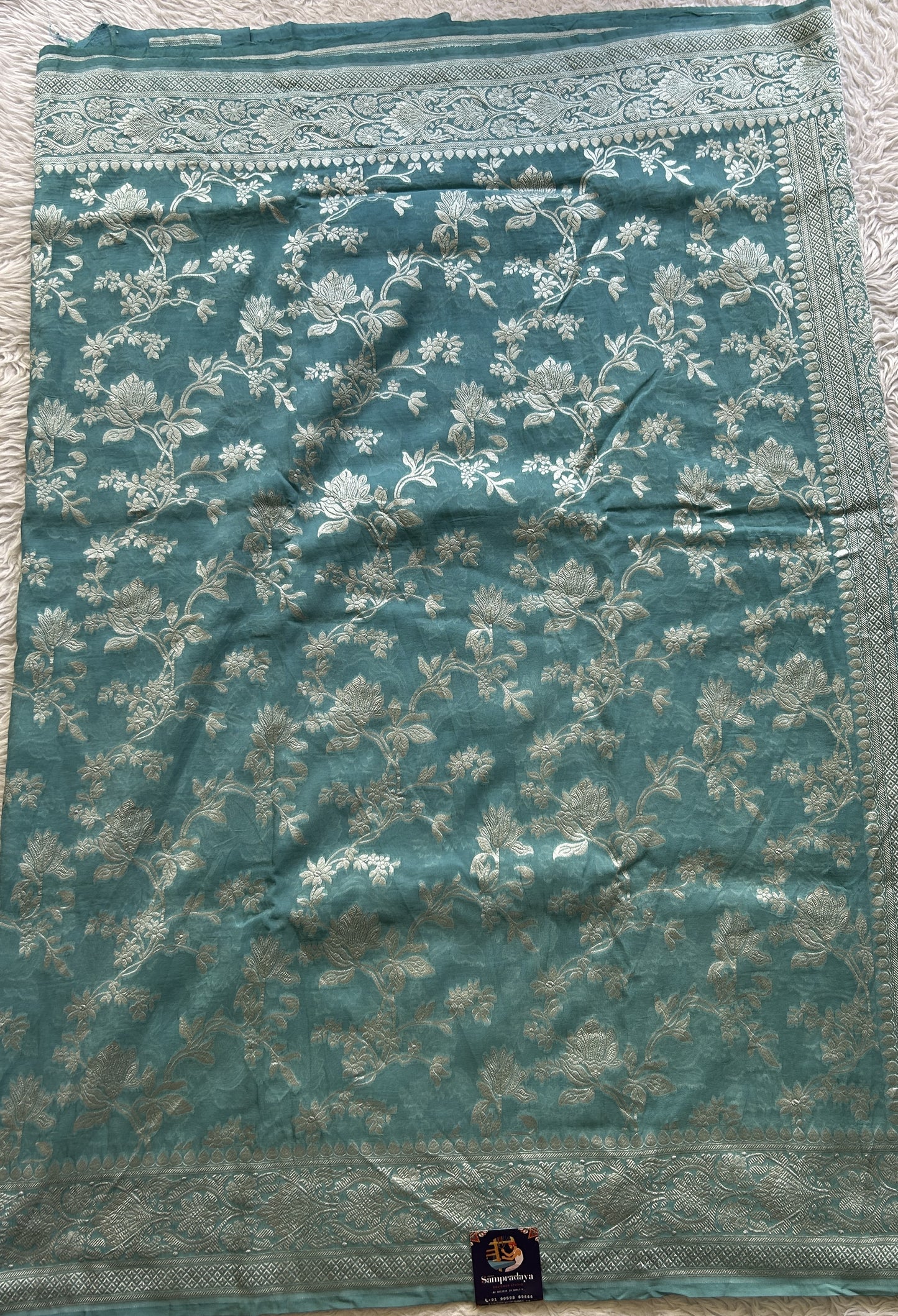 Banarasi Georgette Saree Light Blue Colored Complemented with a Zari border. - Sampradaya Designer Studio