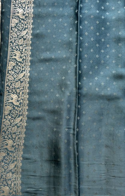 Banarasi Georgette Saree Teal Blue Colored Complemented with a Zari border. - Sampradaya Designer Studio