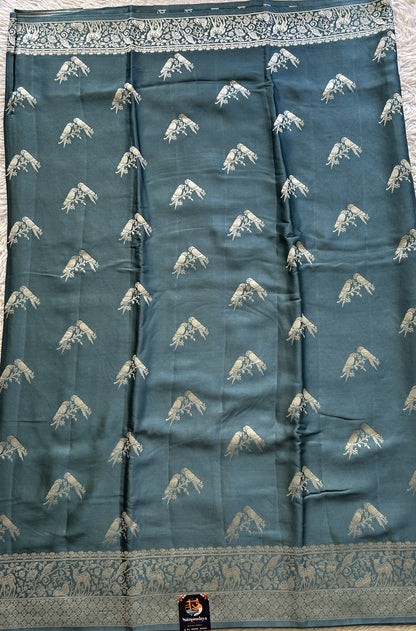 Banarasi Georgette Saree Teal Blue Colored Complemented with a Zari border. - Sampradaya Designer Studio