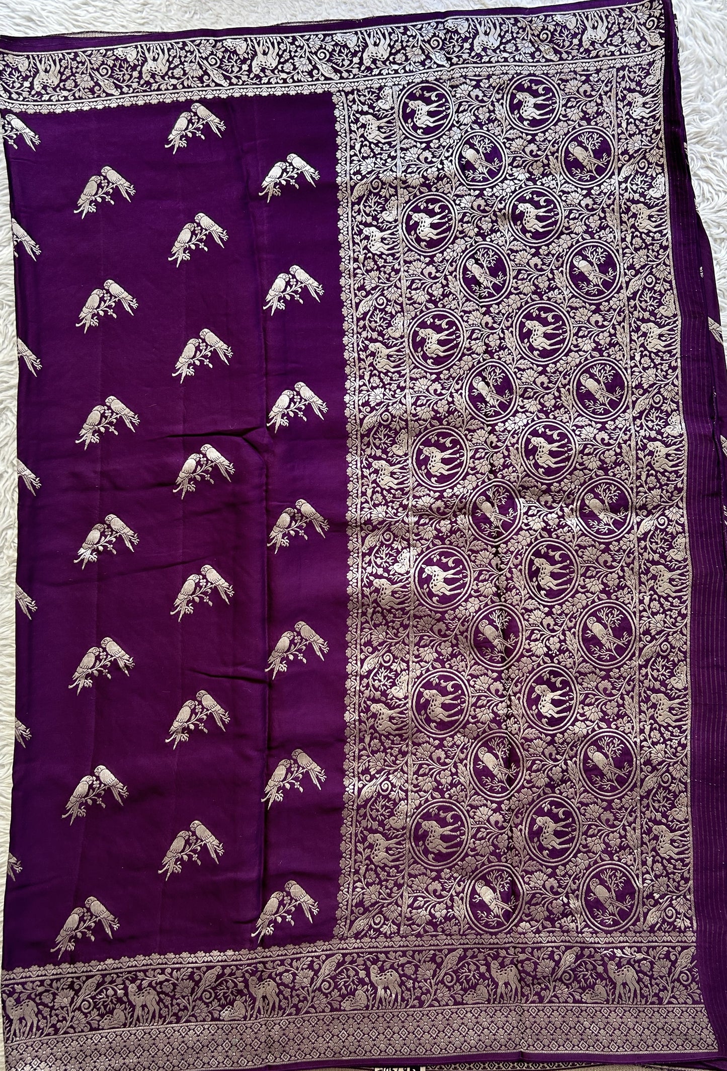 Banarasi Georgette Saree Purple Colored Complemented with a Zari border. - Sampradaya Designer Studio