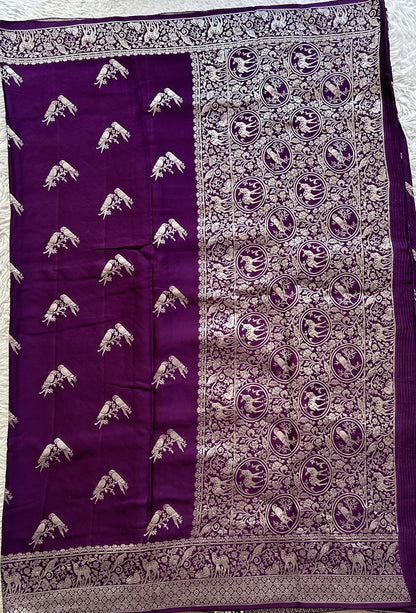 Banarasi Georgette Saree Purple Colored Complemented with a Zari border. - Sampradaya Designer Studio
