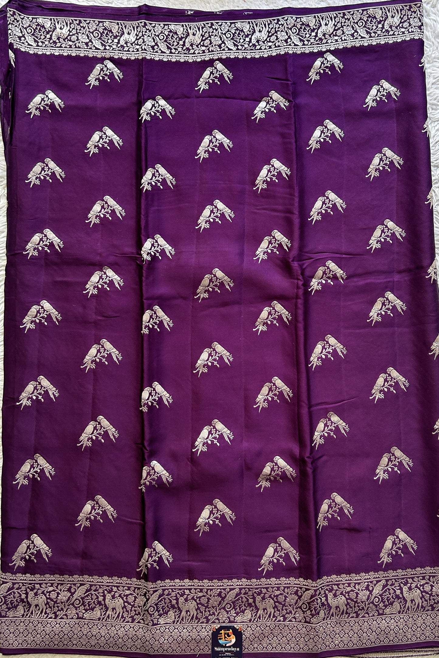 Banarasi Georgette Saree Purple Colored Complemented with a Zari border. - Sampradaya Designer Studio