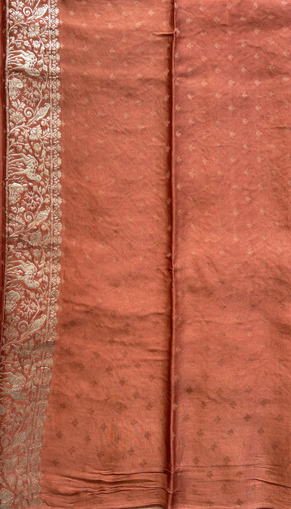 Banarasi Georgette Saree Peach Colored Complemented with a Zari border. - Sampradaya Designer Studio