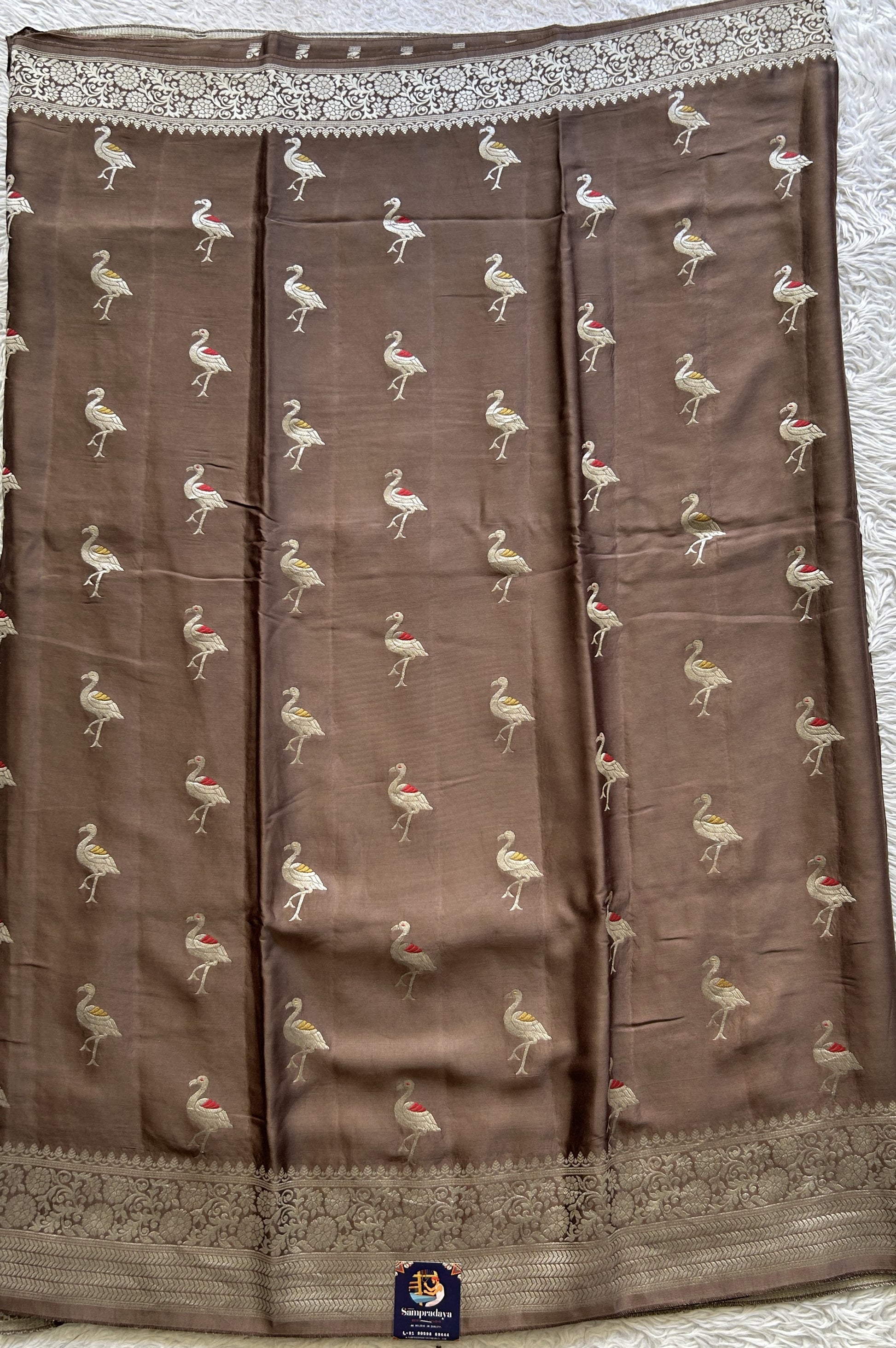 Banarasi Georgette Saree Chocolate Colored Complemented with a Zari border. - Sampradaya Designer Studio