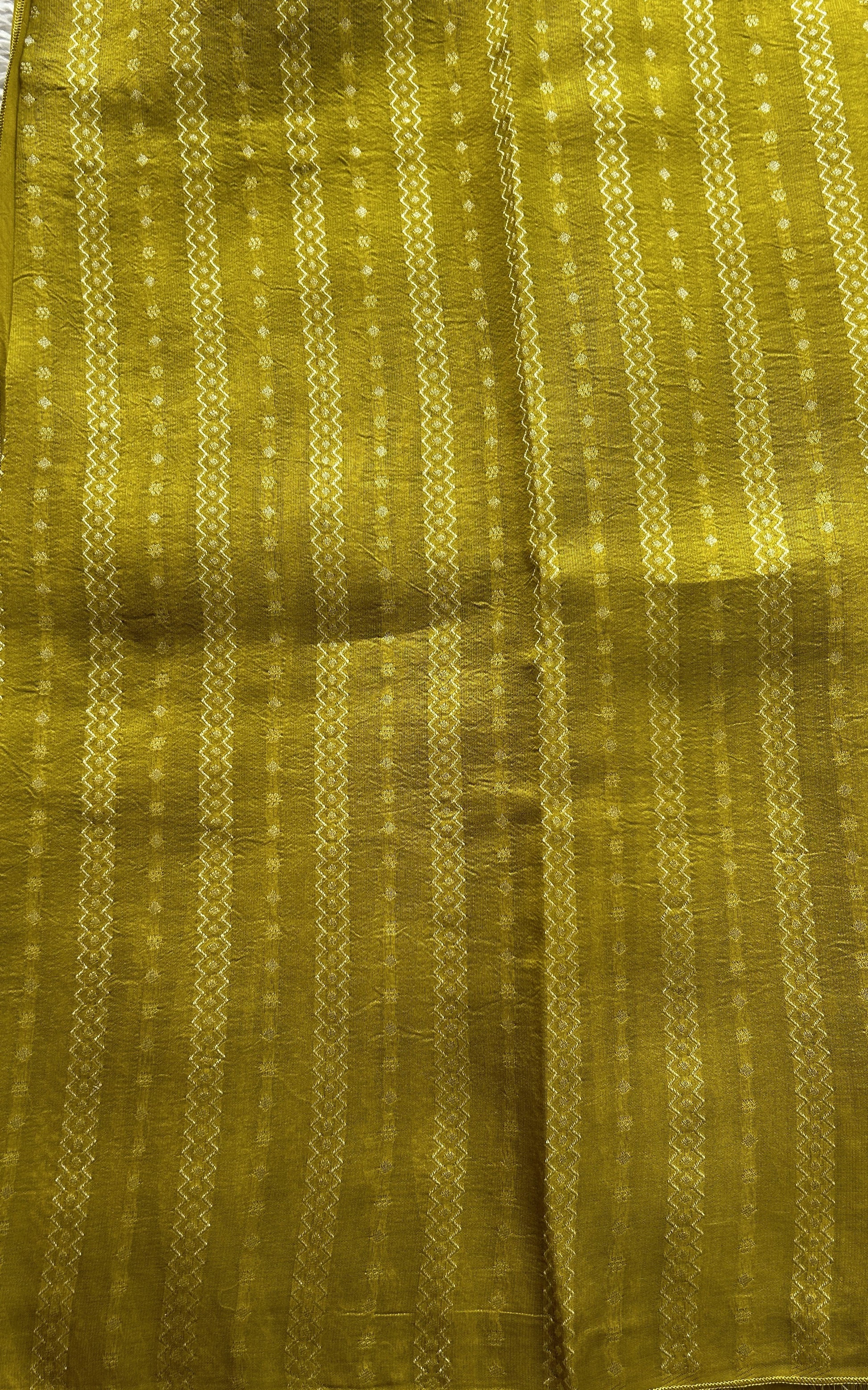 Banarasi Tussar Georgette Saree Pear Colored Complemented with a Minakari border. - Sampradaya Designer Studio