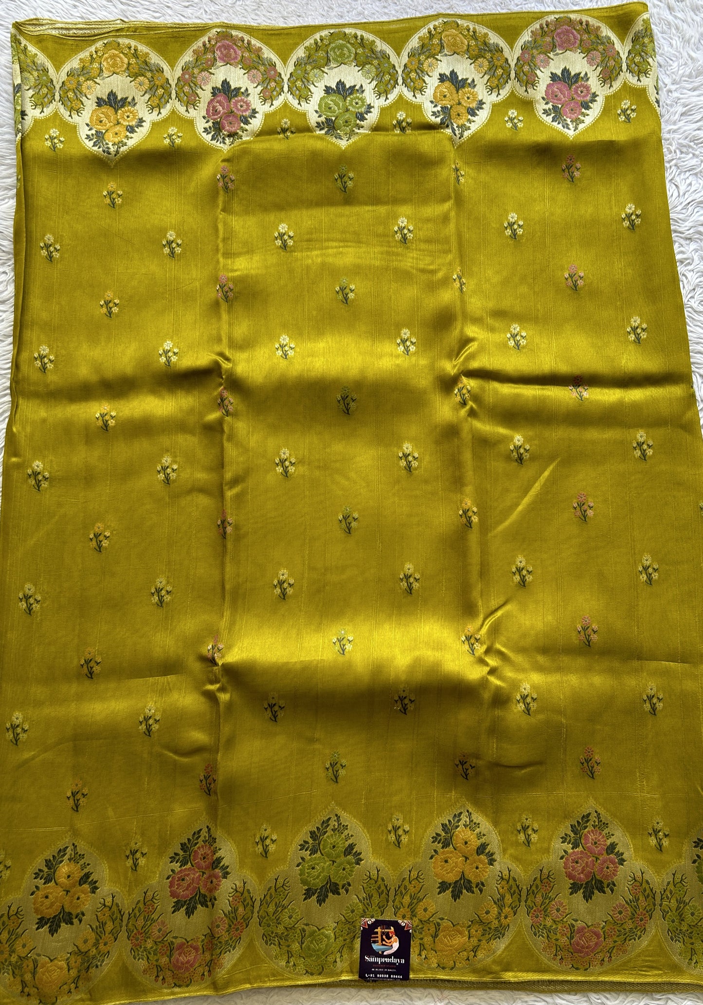 Banarasi Tussar Georgette Saree Pear Colored Complemented with a Minakari border. - Sampradaya Designer Studio