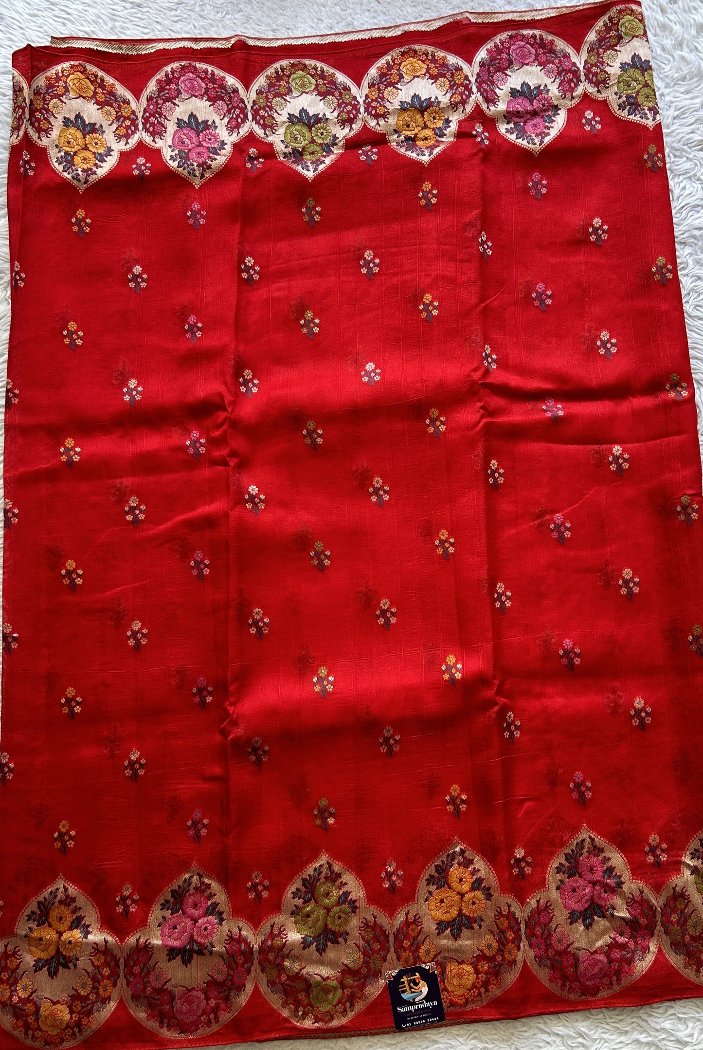 Banarasi Tussar Georgette Saree Red Colored Complemented with a Minakari border. - Sampradaya Designer Studio