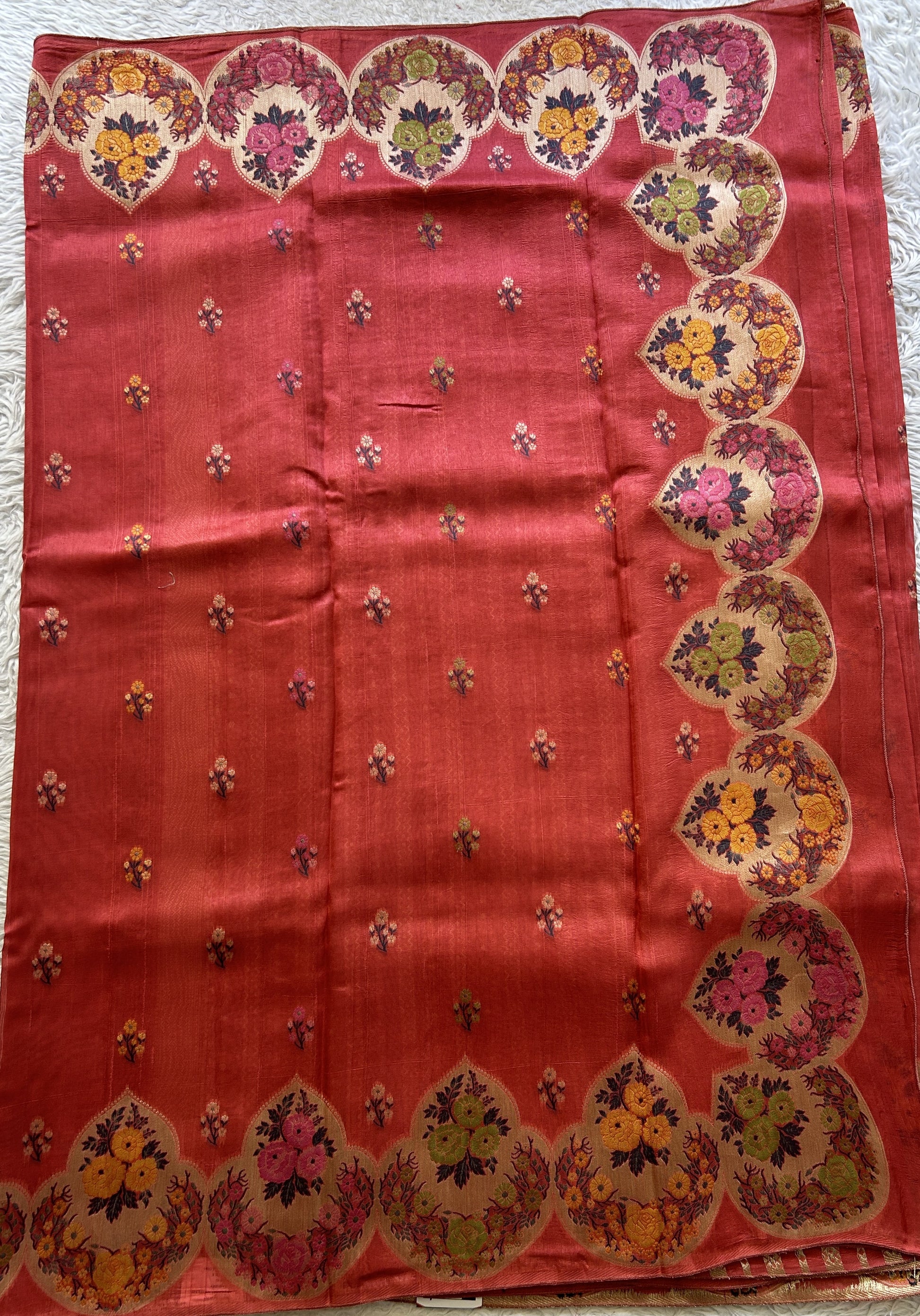 Banarasi Tussar Georgette Saree Peach Colored Complemented with a Minakari border. - Sampradaya Designer Studio
