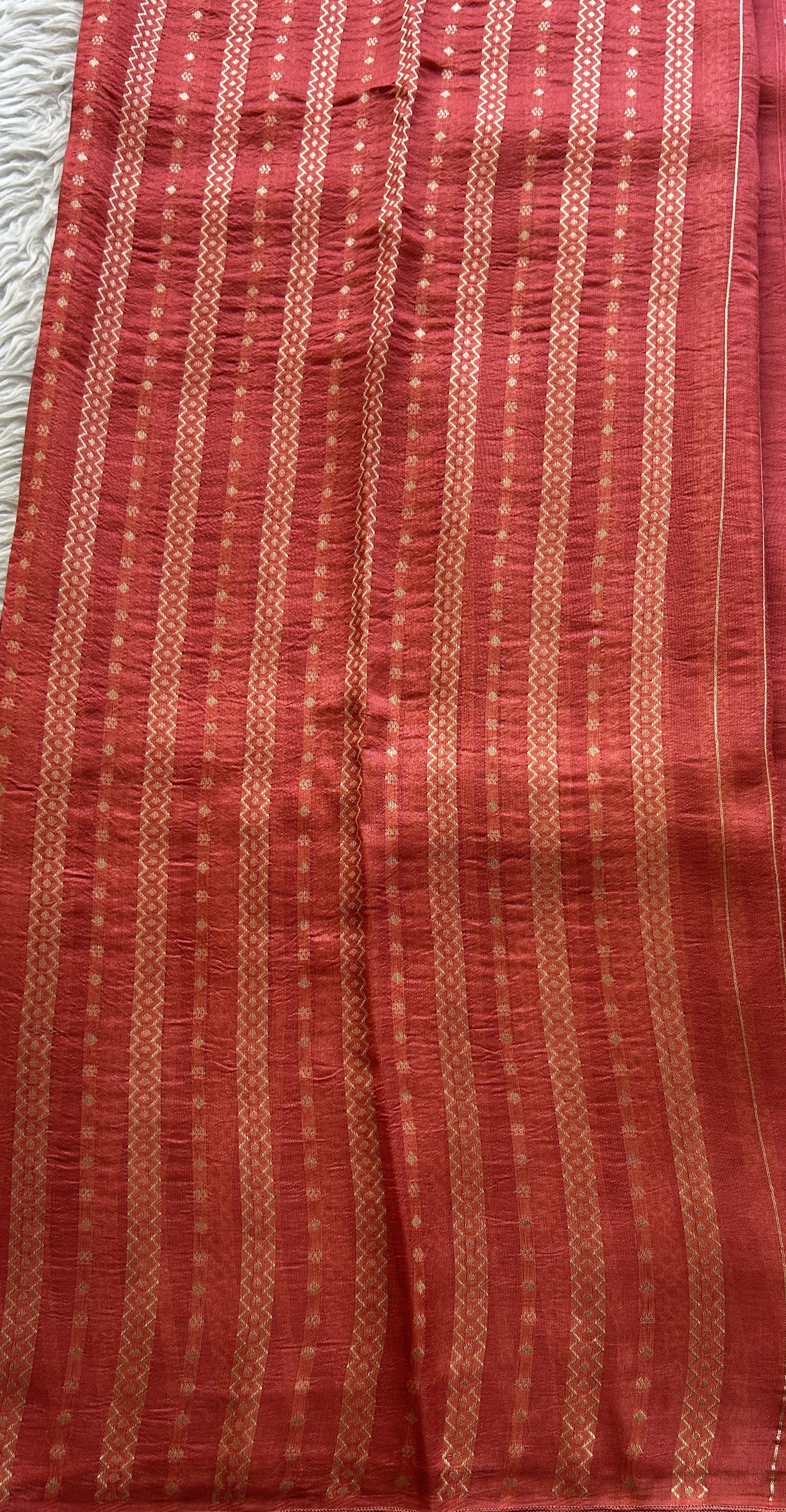 Banarasi Tussar Georgette Saree Peach Colored Complemented with a Minakari border. - Sampradaya Designer Studio