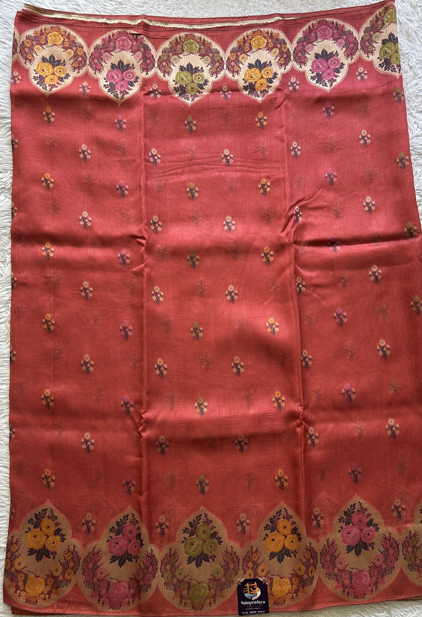 Banarasi Tussar Georgette Saree Peach Colored Complemented with a Minakari border. - Sampradaya Designer Studio