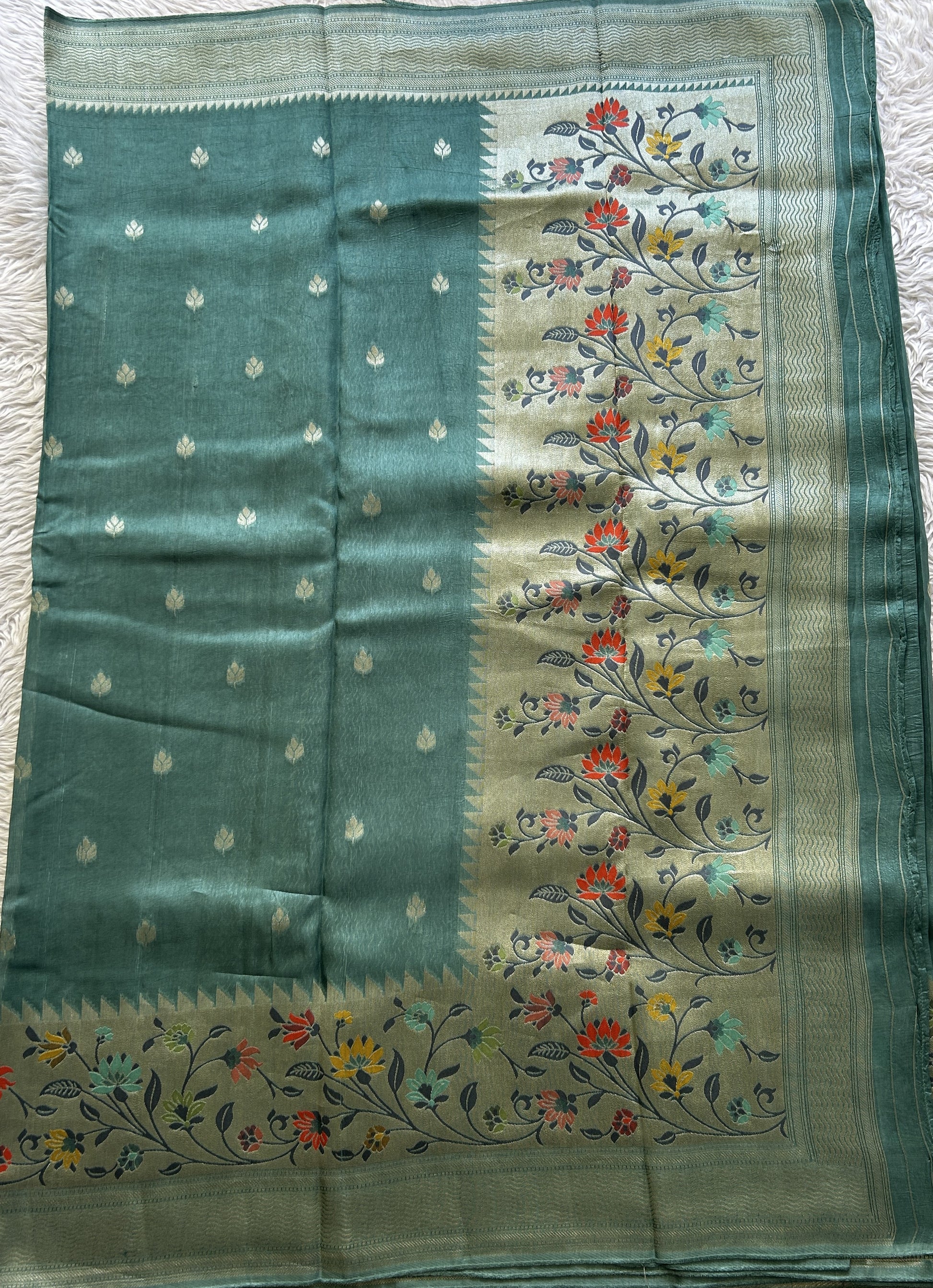 Banarasi Tussar Georgette Saree Tiffany Blue Colored Complemented with a Minakari border. - Sampradaya Designer Studio