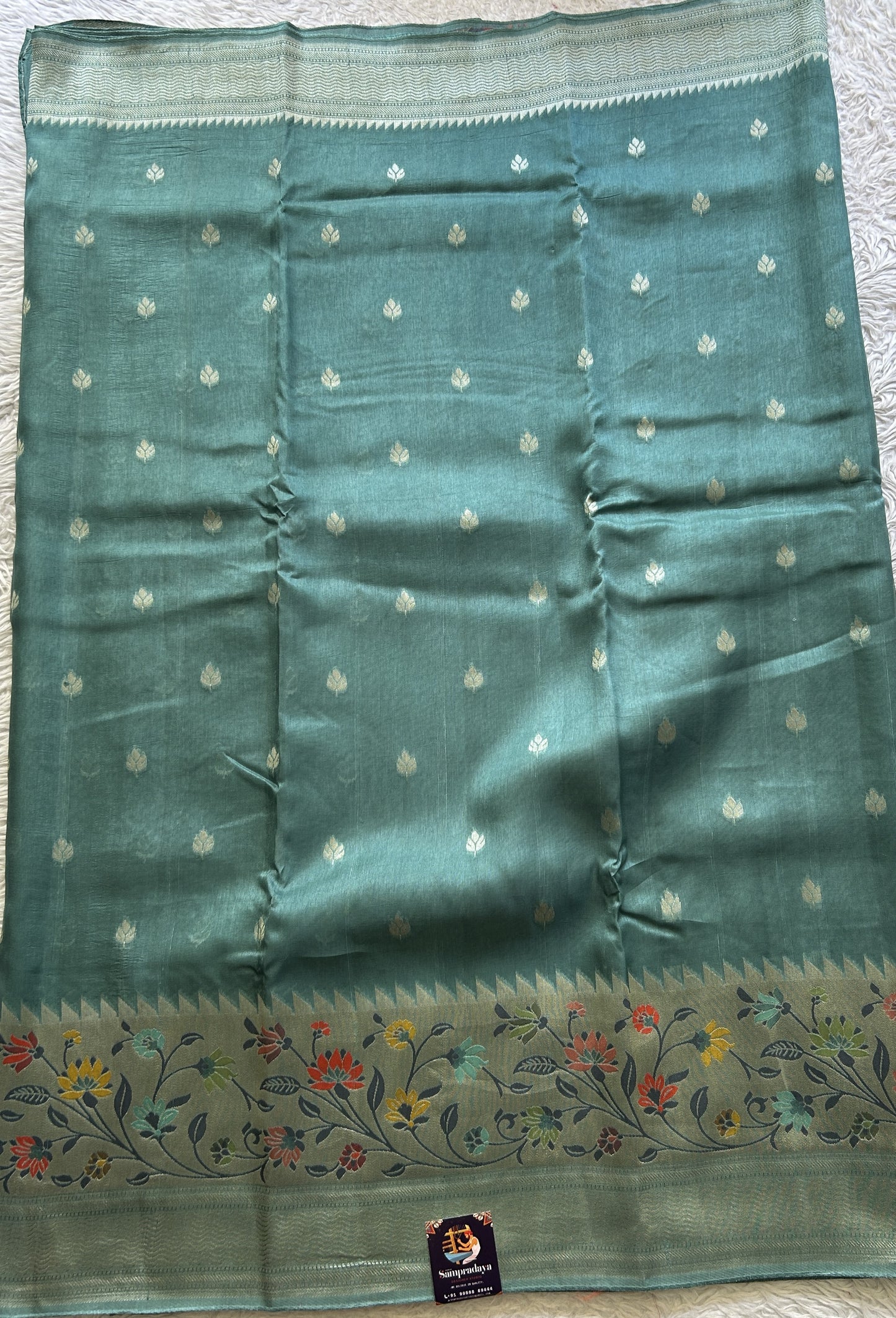 Banarasi Tussar Georgette Saree Tiffany Blue Colored Complemented with a Minakari border. - Sampradaya Designer Studio