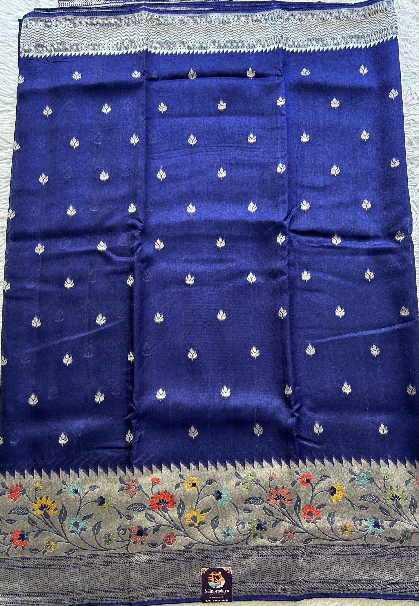 Banarasi Tussar Georgette Saree Royal Blue Colored Complemented with a Minakari border. - Sampradaya Designer Studio