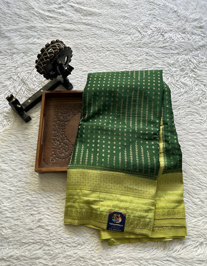 Semi Georgette Saree Green Colored Paired with a Zari Border. - Sampradaya Designer Studio