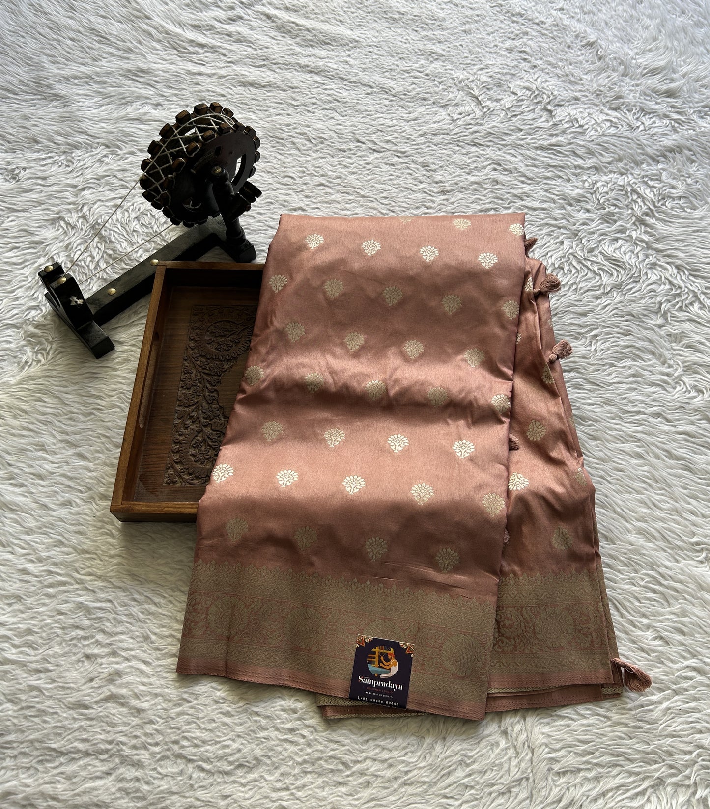 Semi Georgette Saree Light Peach Colored Elegantly Paired with a Zari Border. - Sampradaya Designer Studio