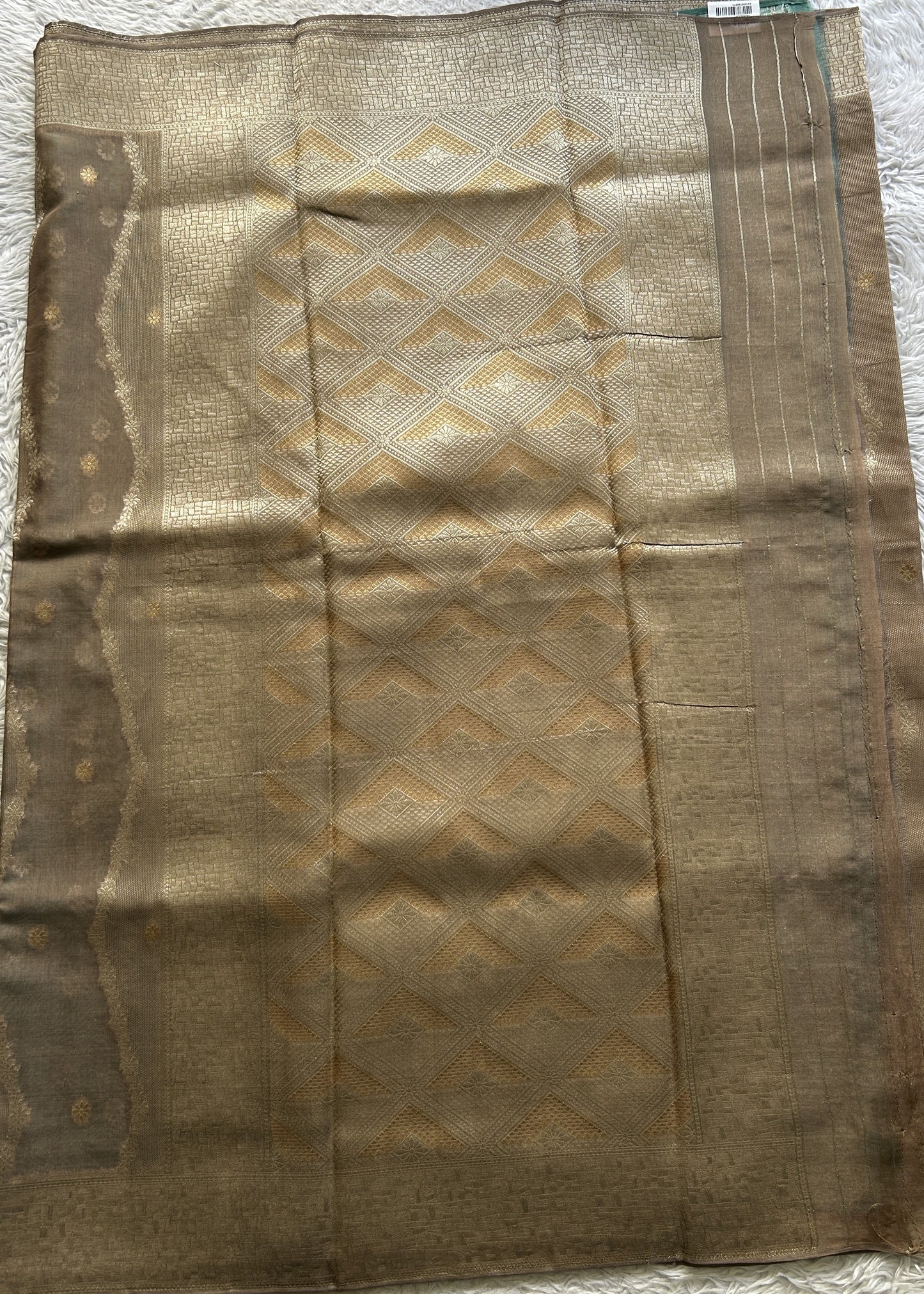 Semi Georgette Saree Light Brown Colored Elegantly Paired with a Zari Border. - Sampradaya Designer Studio