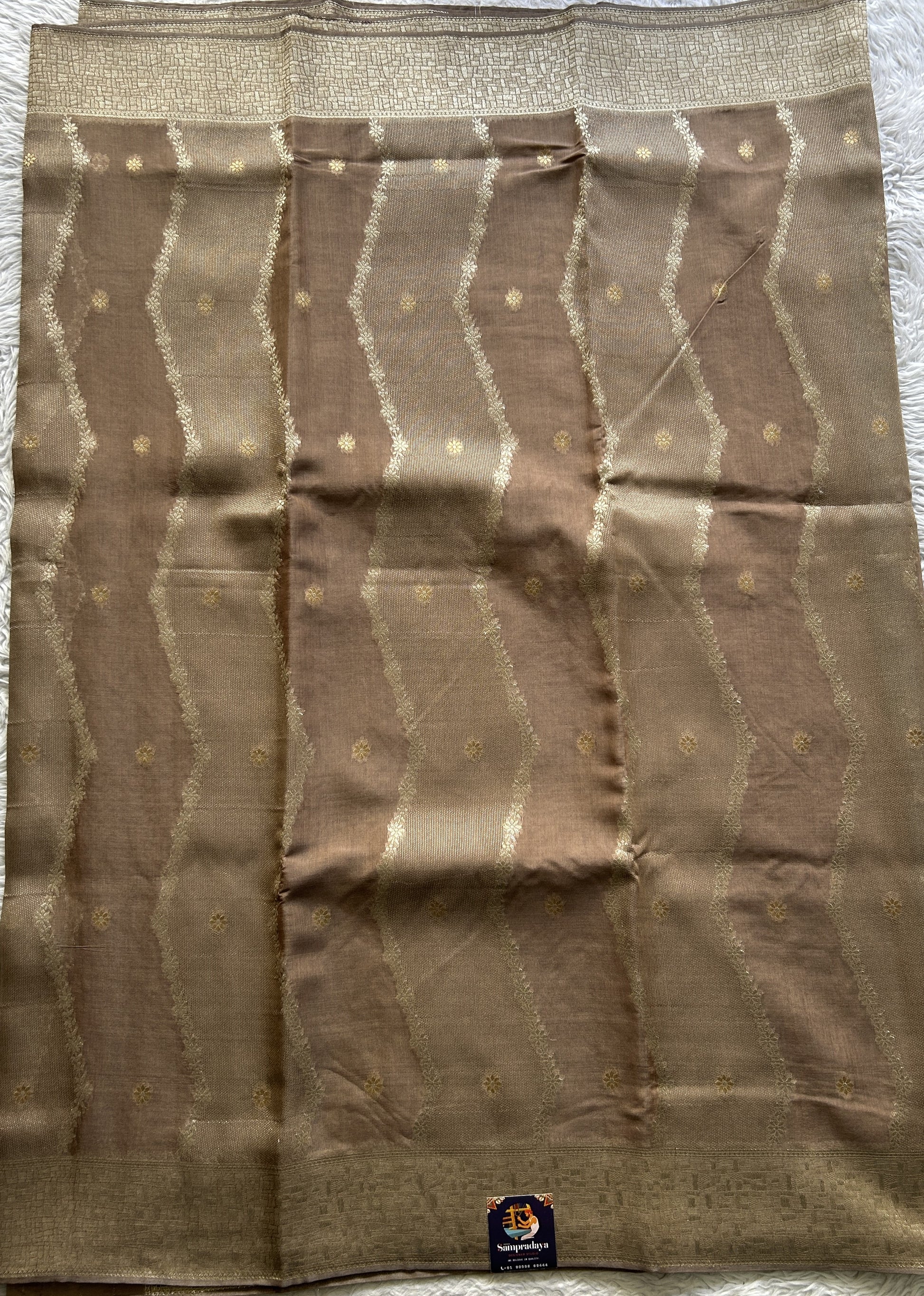 Semi Georgette Saree Light Brown Colored Elegantly Paired with a Zari Border. - Sampradaya Designer Studio