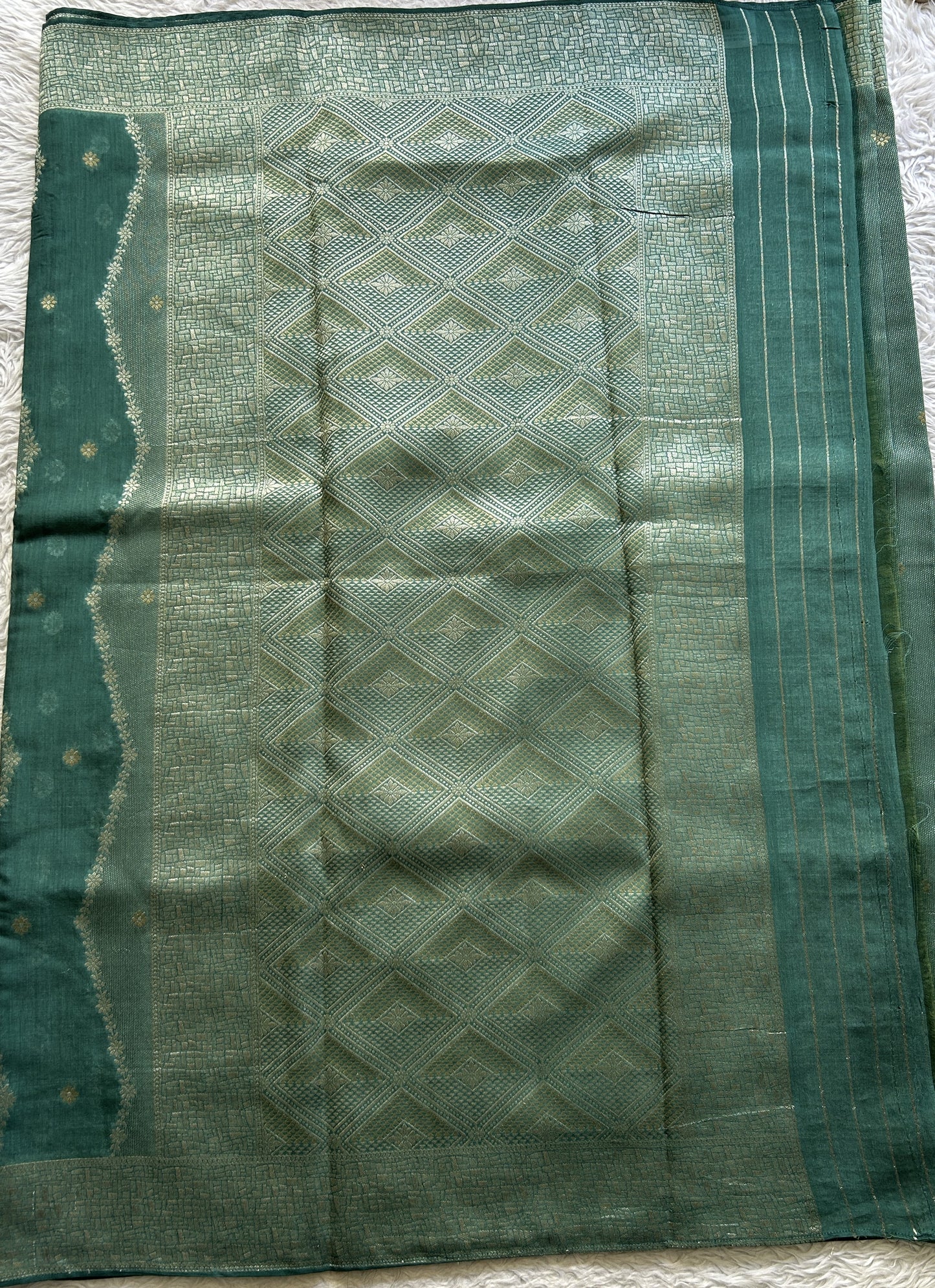 Semi Georgette Saree Dark Sea Green Colored Elegantly Paired with a Zari Border. - Sampradaya Designer Studio