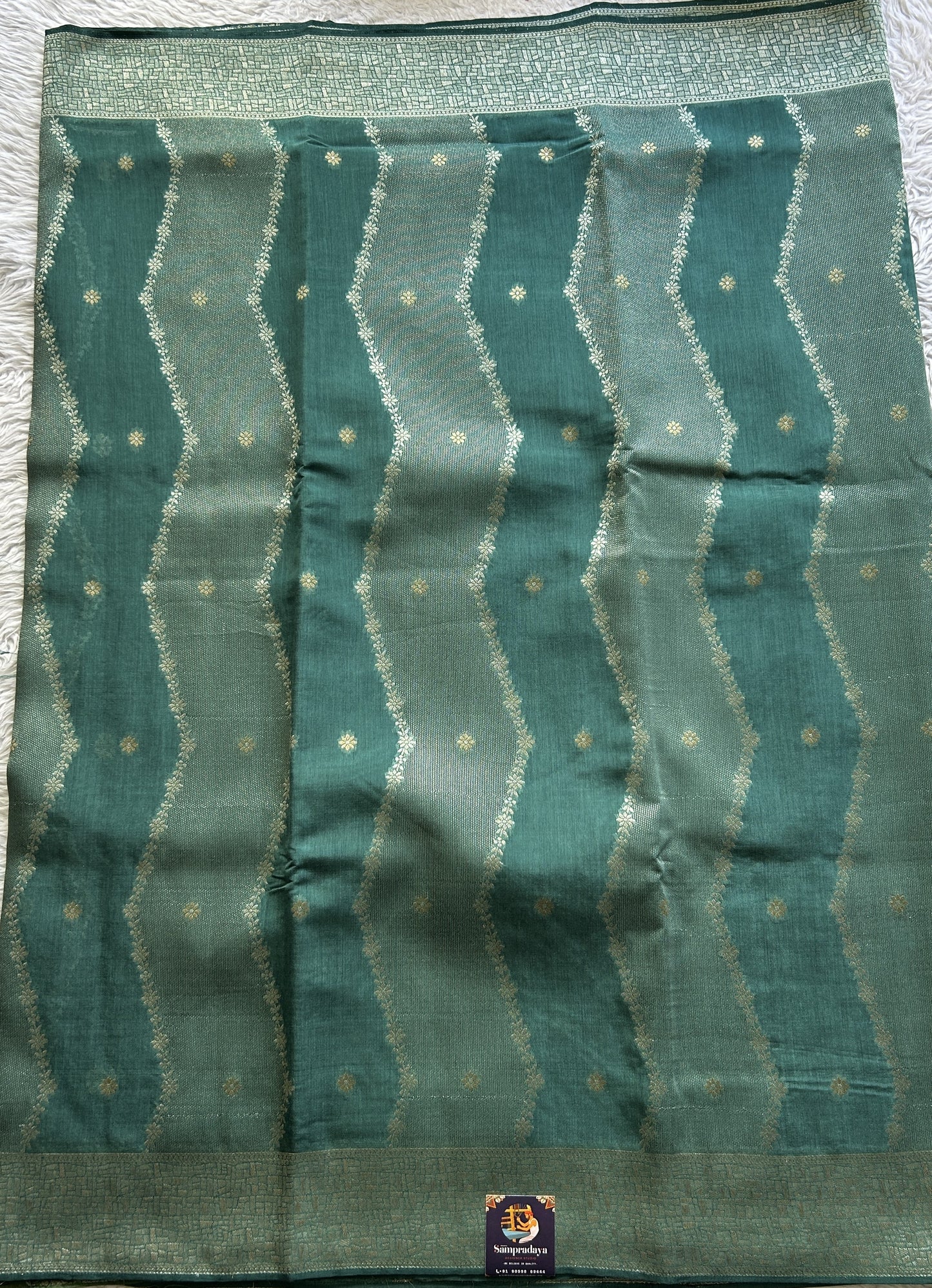 Semi Georgette Saree Dark Sea Green Colored Elegantly Paired with a Zari Border. - Sampradaya Designer Studio