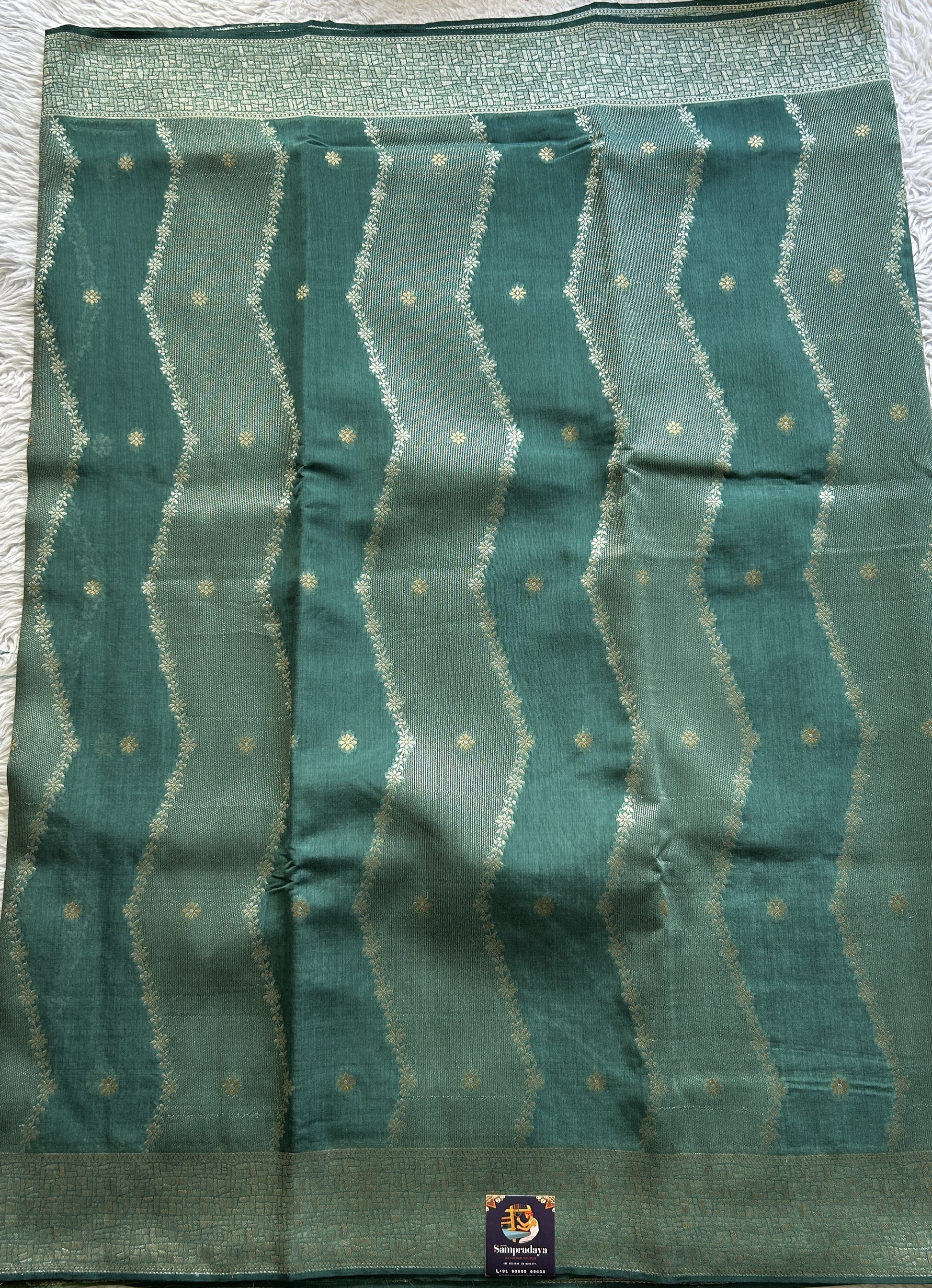 Semi Georgette Saree Dark Sea Green Colored Elegantly Paired with a Zari Border. - Sampradaya Designer Studio