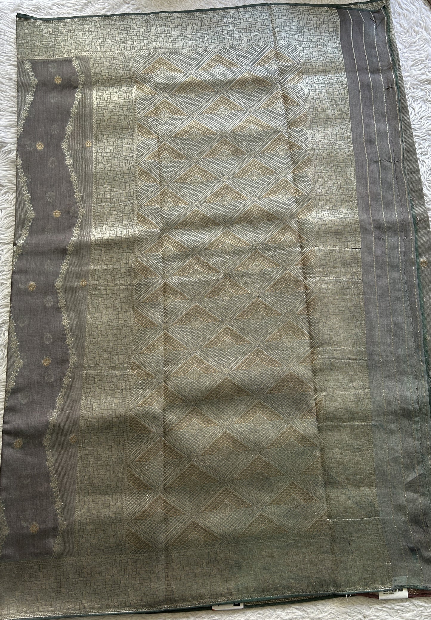 Semi Georgette Saree Fossil Colored Elegantly Paired with a Zari Border. - Sampradaya Designer Studio